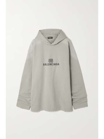 BALENCIAGA Hoodie aus Baumwoll-Jersey mit Print in Distressed-Optik