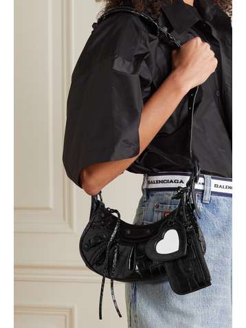 BALENCIAGA Cagole XS Schultertasche aus Leder mit Krokodileffekt und Nieten