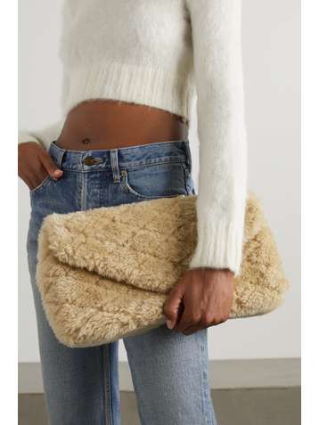 SAINT LAURENT Sade large quilted shearling clutch