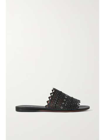 ALAÏA Eyelet-embellished laser-cut raffia and leather slides