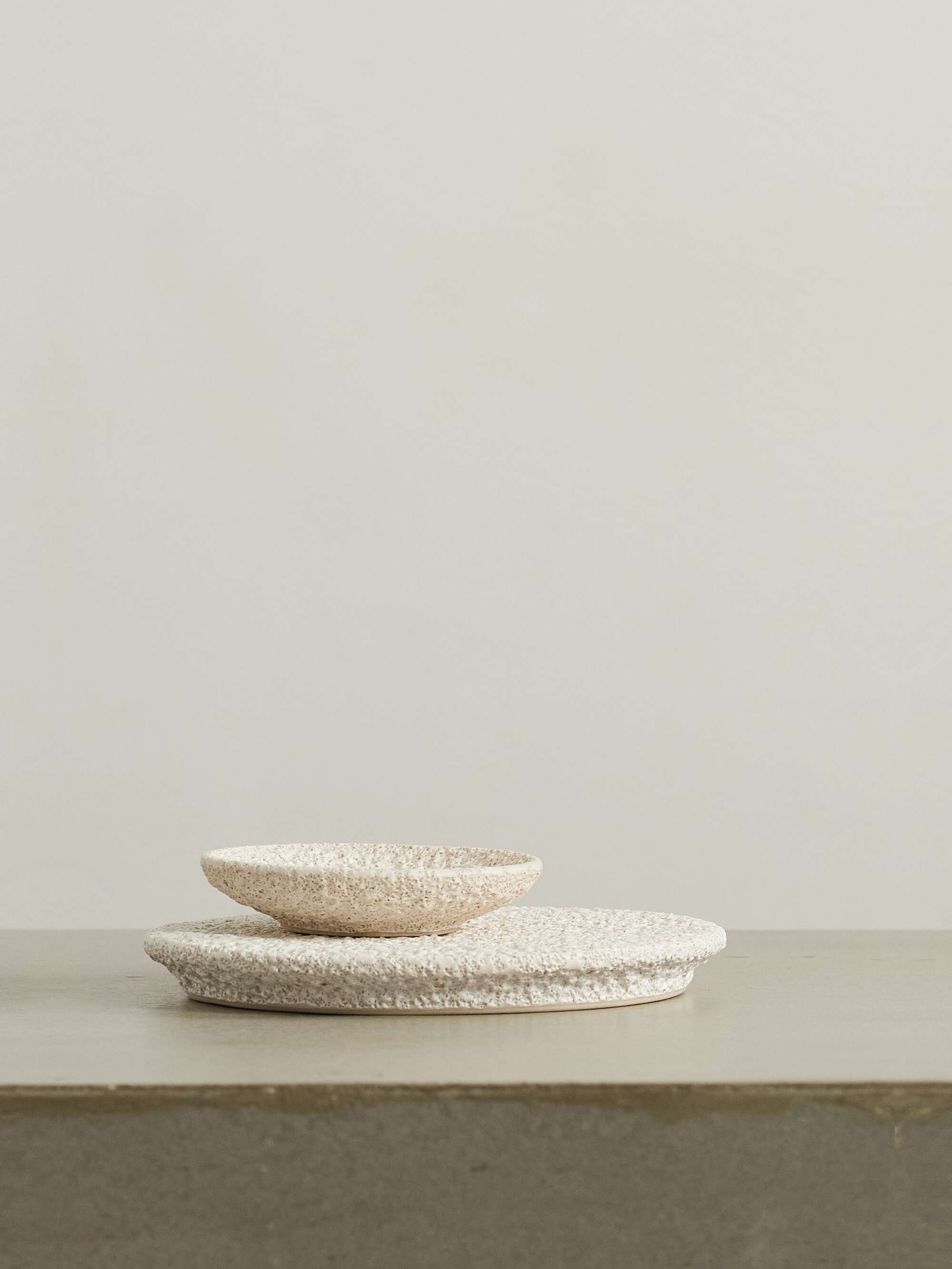 Set of two glazed ceramic plates