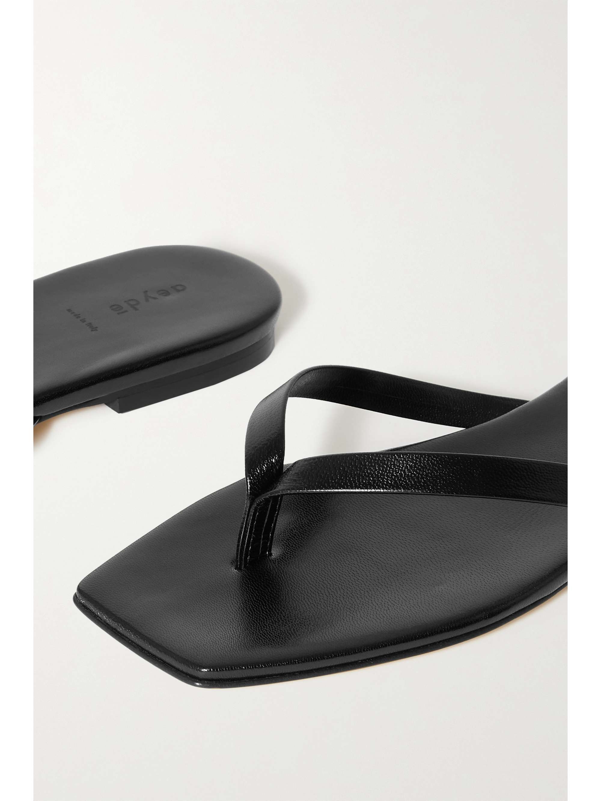In neutral tones that compliment any look, the Leather Flip Flops in Tan from Melissa Odabash 