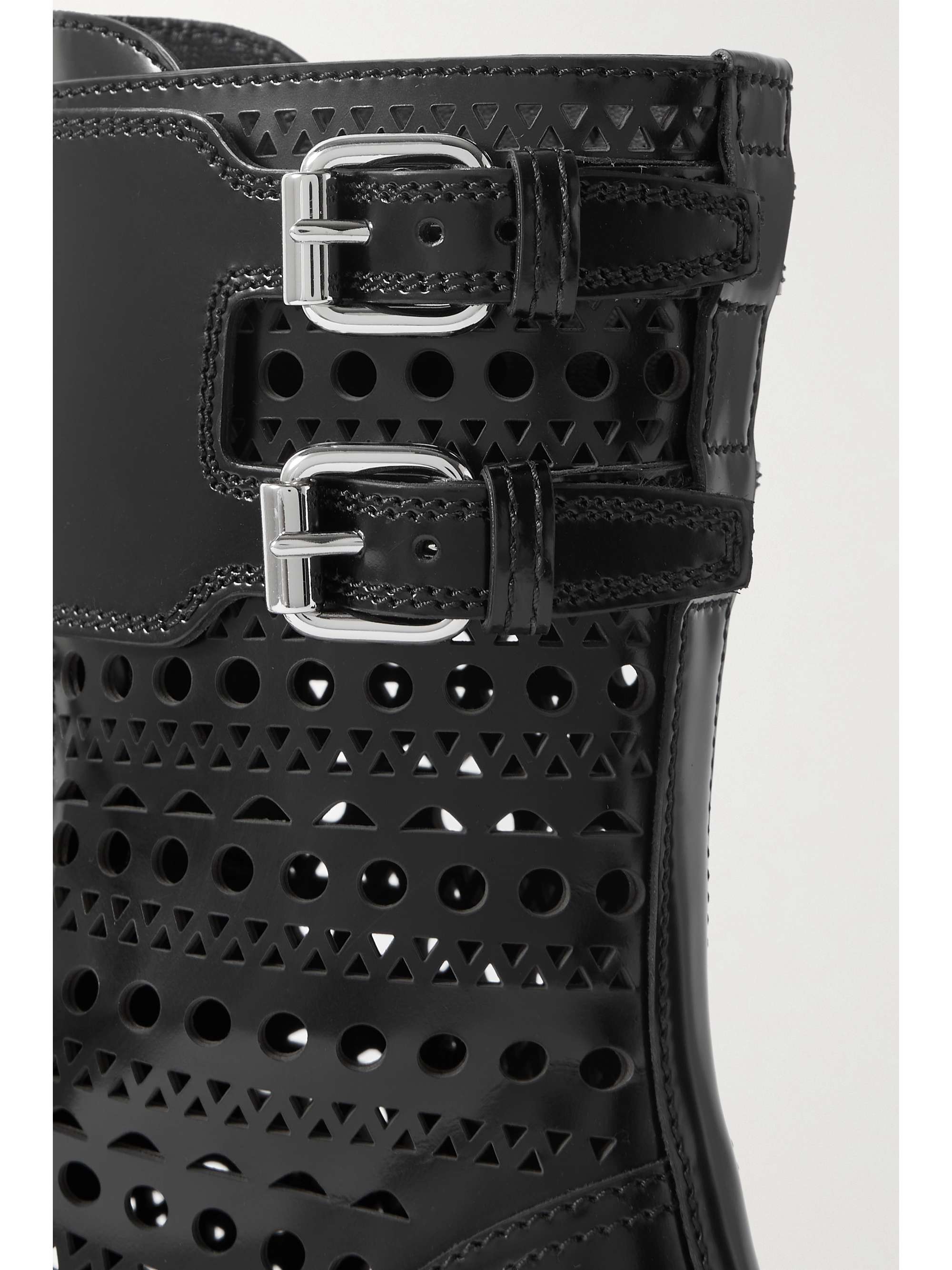 ALAÏA Buckled laser-cut leather boots
