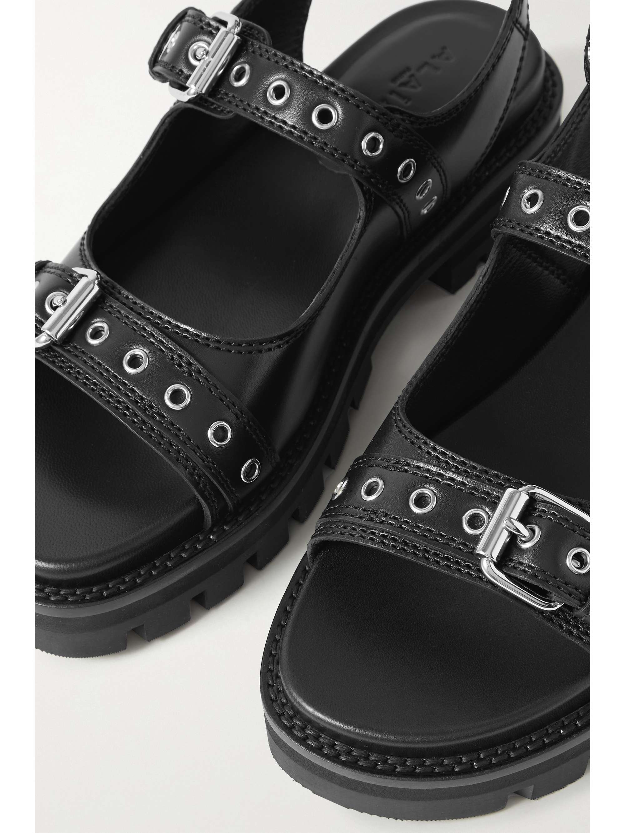 ALAÏA 30 buckled leather sandals