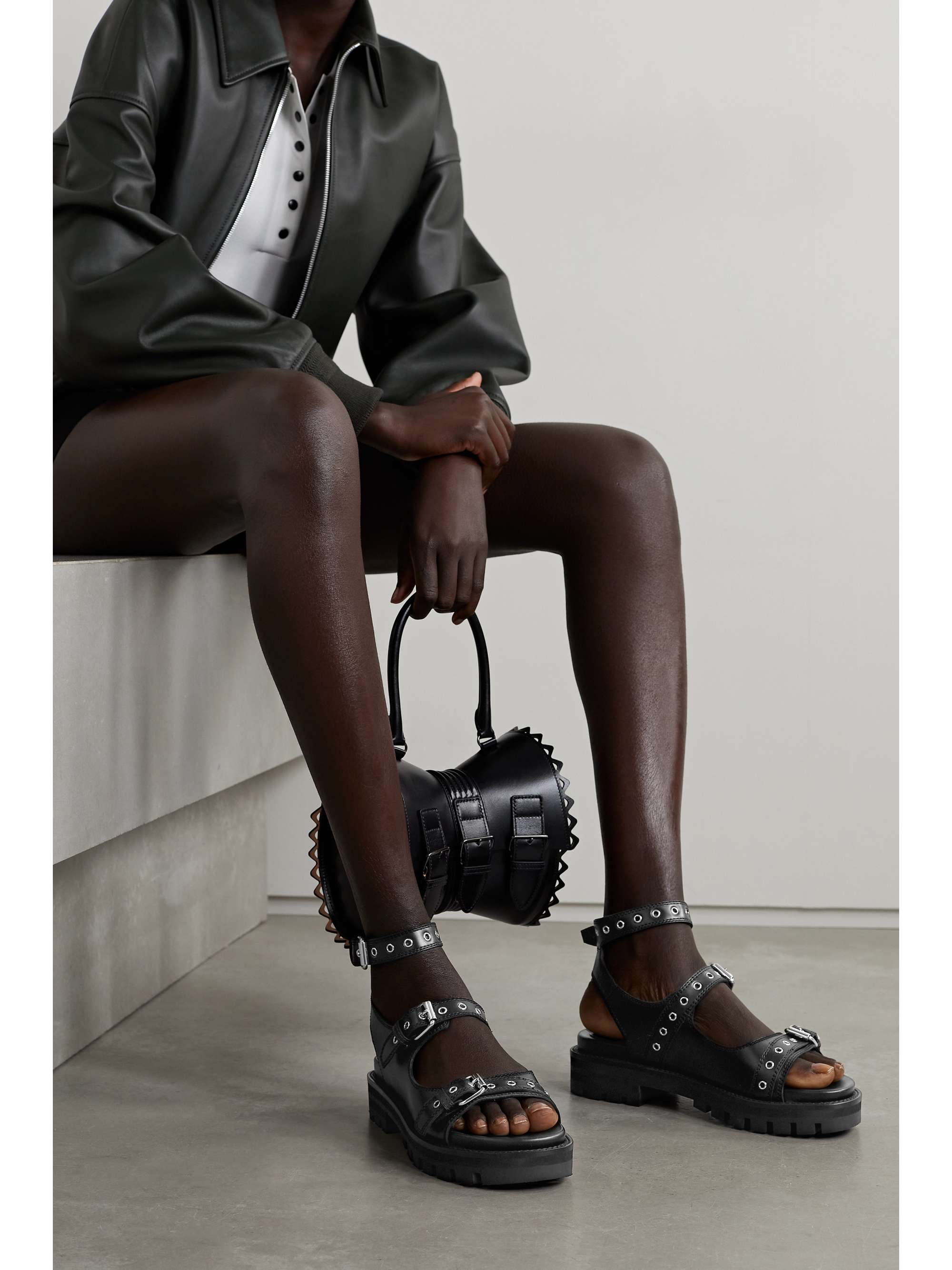ALAÏA 30 buckled leather sandals