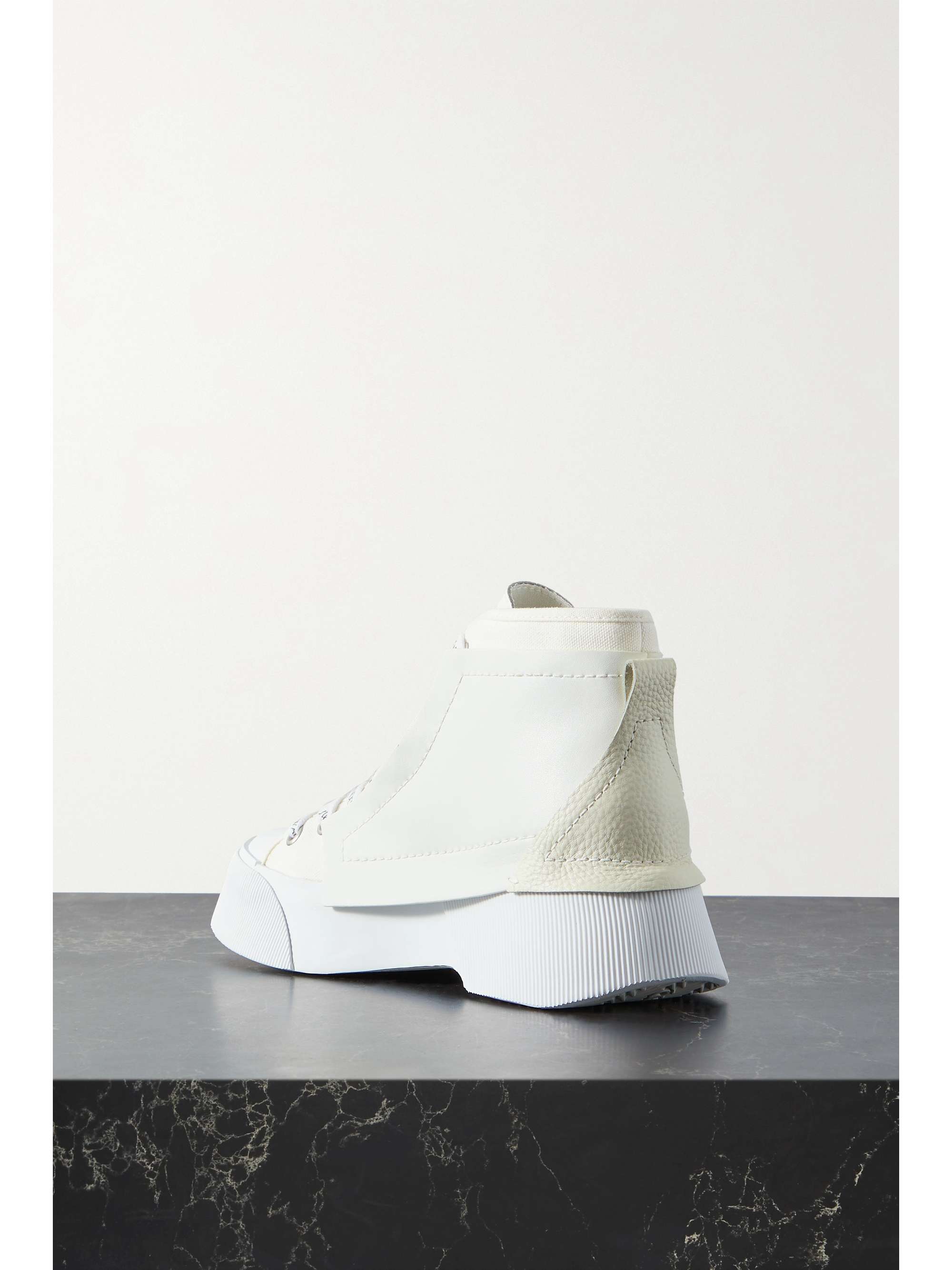 JW ANDERSON Paneled leather and canvas high-top sneakers