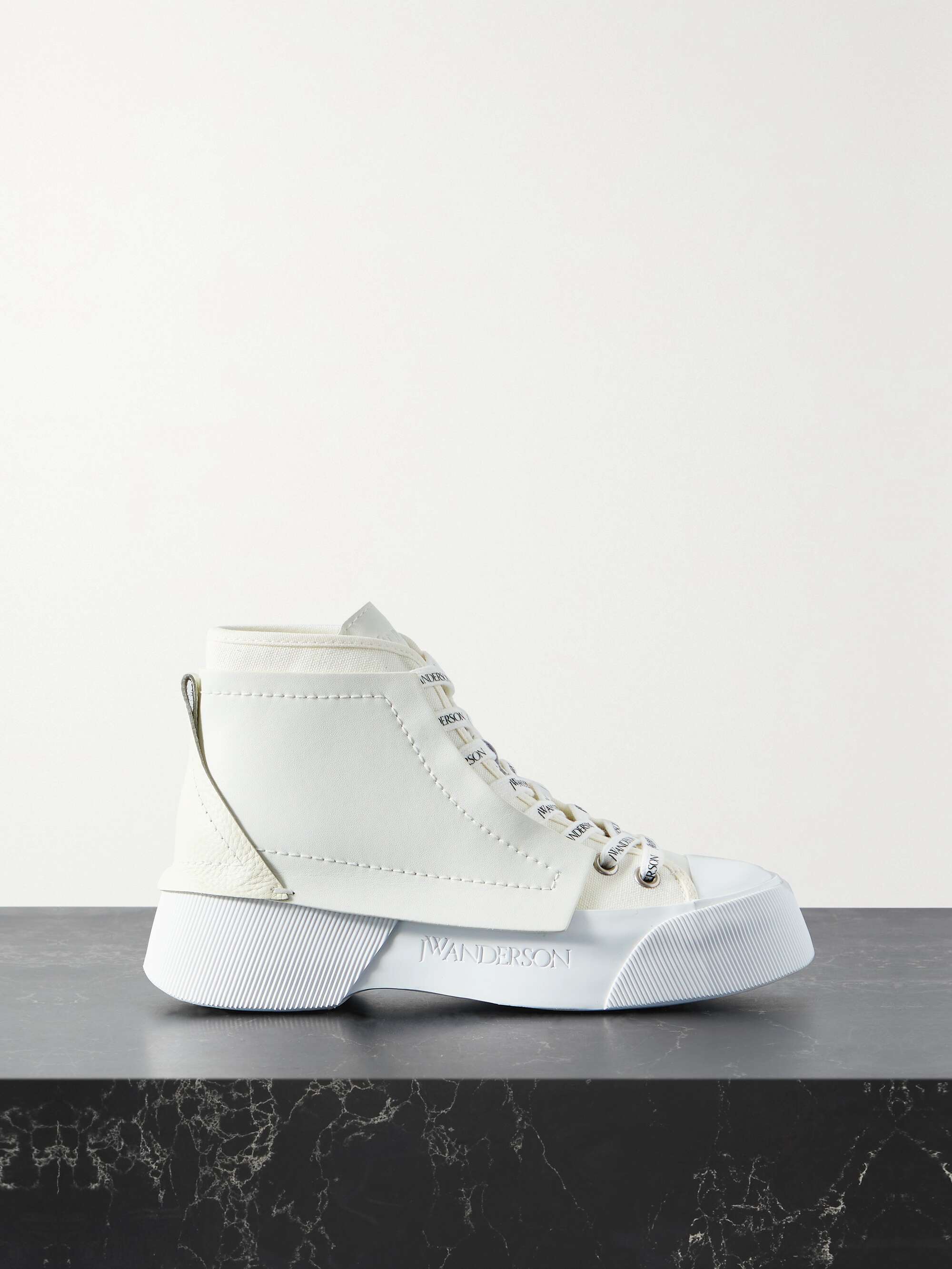 JW ANDERSON Paneled leather and canvas high-top sneakers | NET-A-PORTER