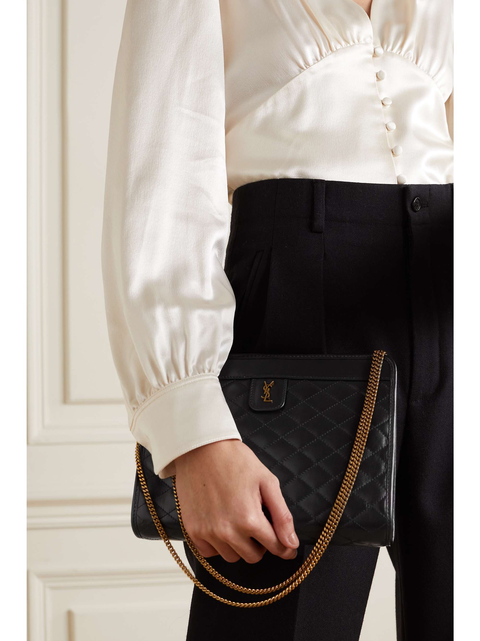 Black Victoire quilted leather clutch SAINT LAURENT NETAPORTER