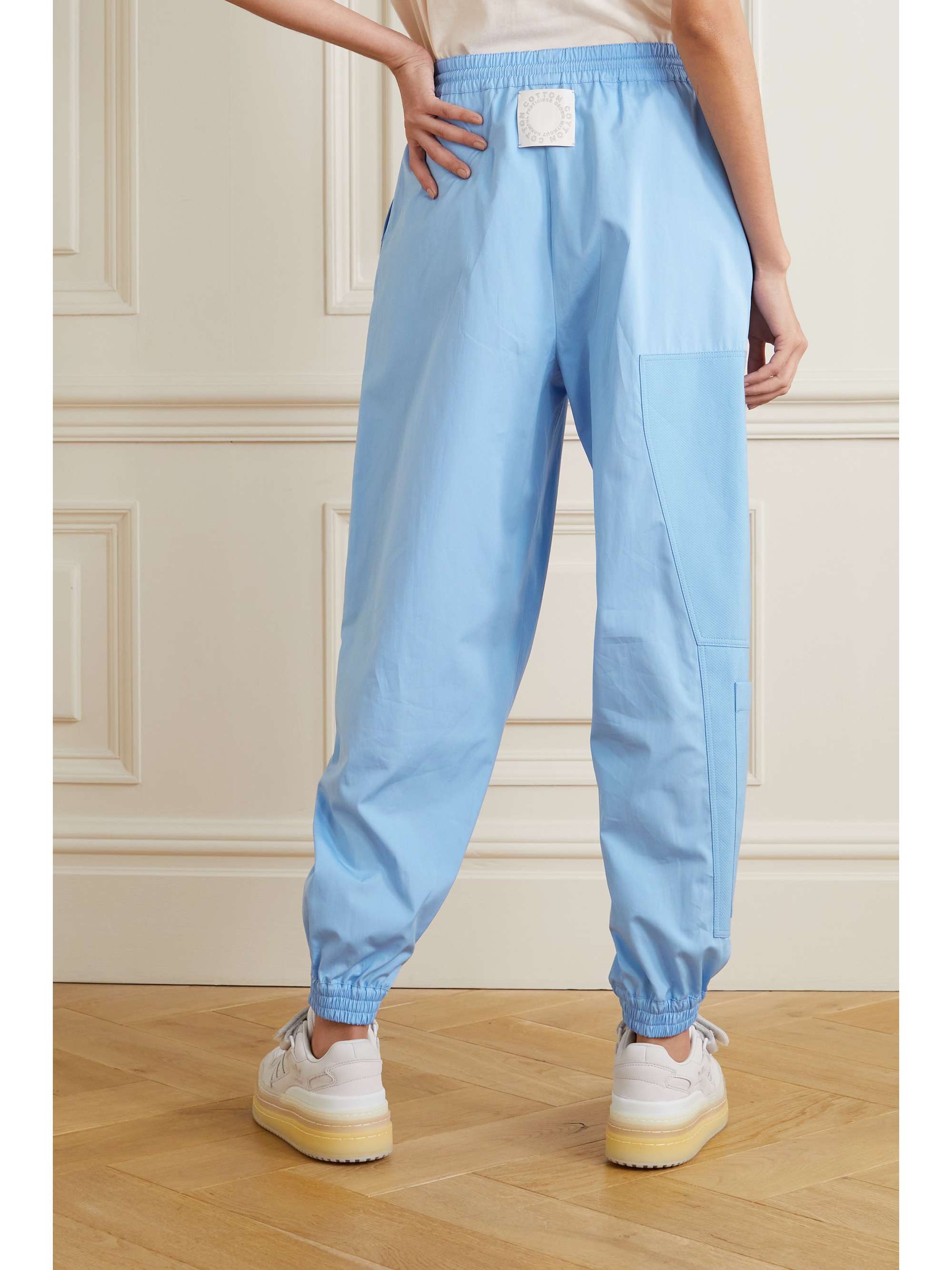 STELLA MCCARTNEY + NET SUSTAIN Kara paneled organic cotton-ripstop and shell track pants
