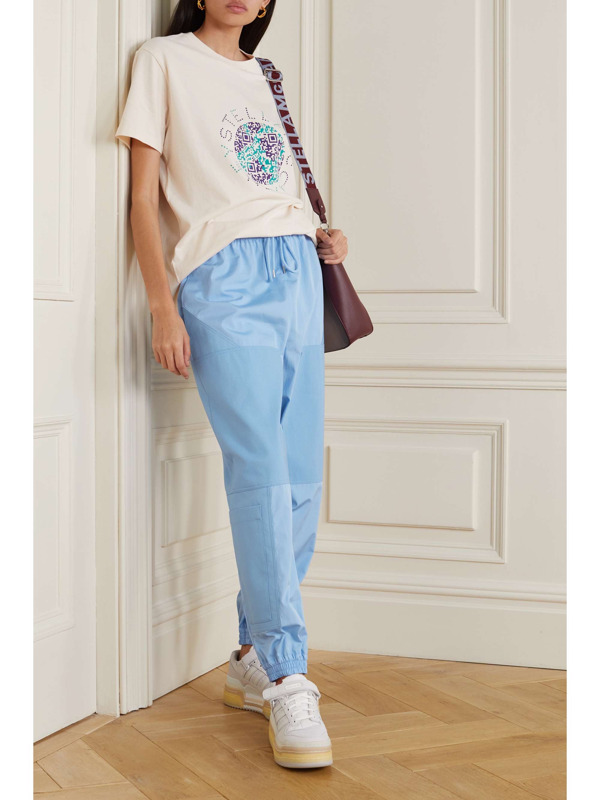 STELLA MCCARTNEY + NET SUSTAIN Kara paneled organic cotton-ripstop and shell track pants