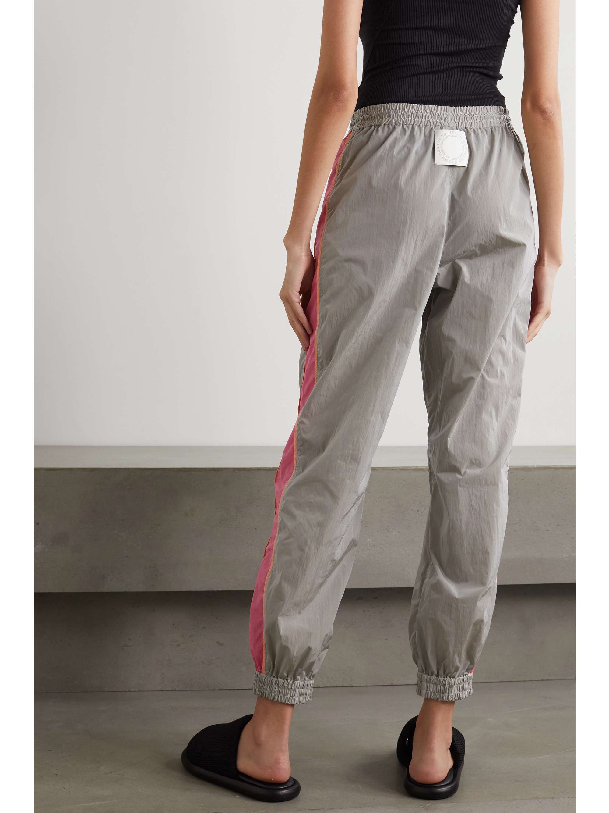 STELLA MCCARTNEY Kira appliquéd striped ECONYL track pants
