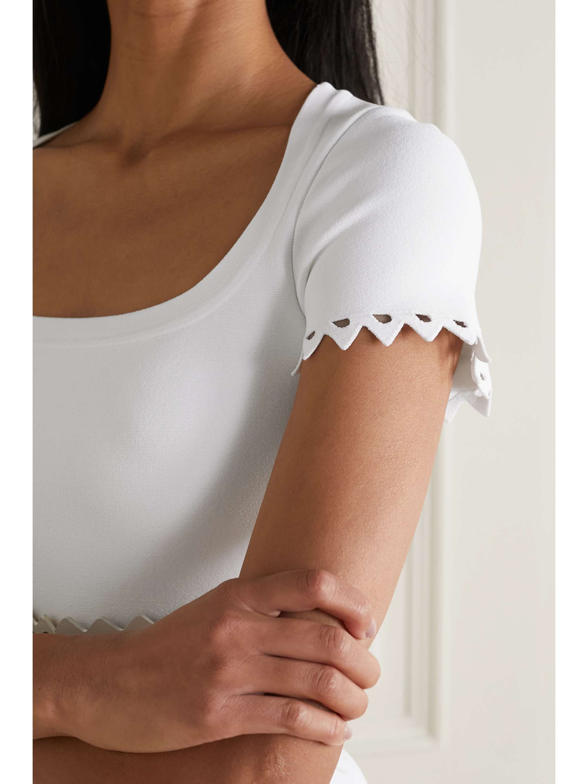 ALAÏA Editions laser-cut stretch-knit mini dress