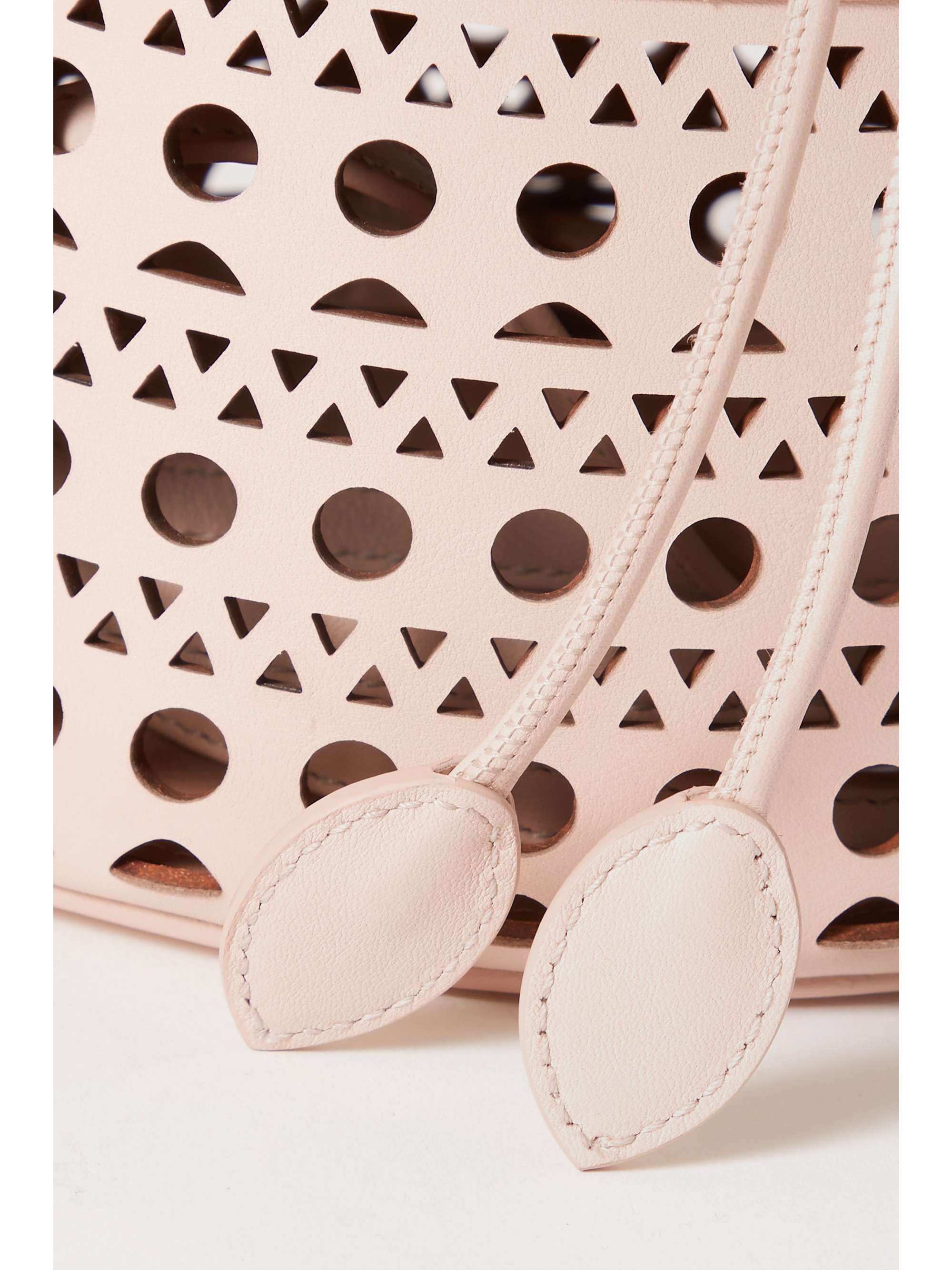 ALAÏA Bucket Corset Tasche aus lasergeschnittenem Leder