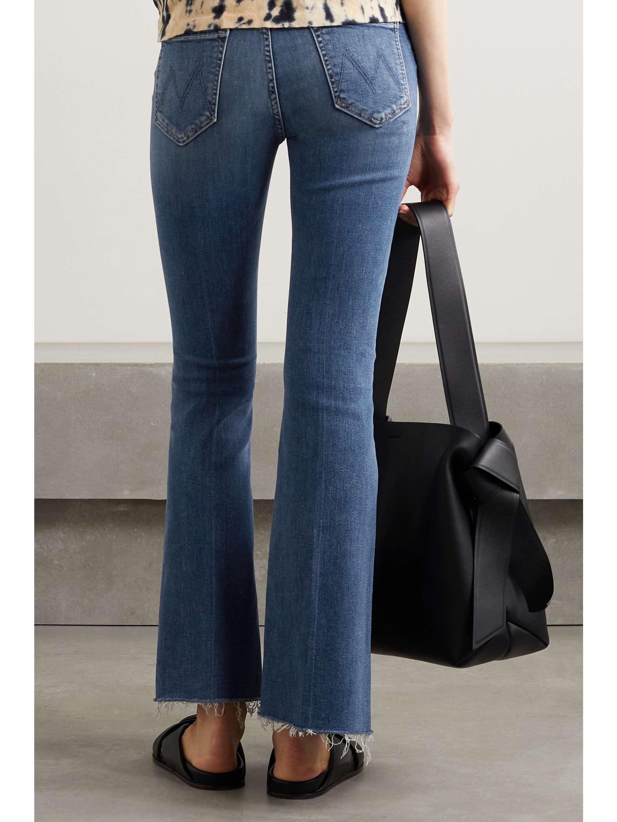 MOTHER The Weekender frayed high-rise flared jeans