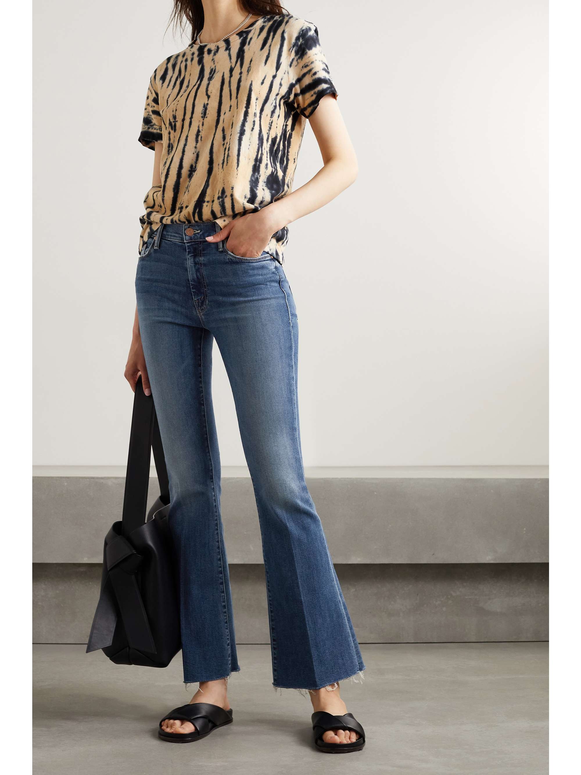MOTHER The Weekender frayed high-rise flared jeans
