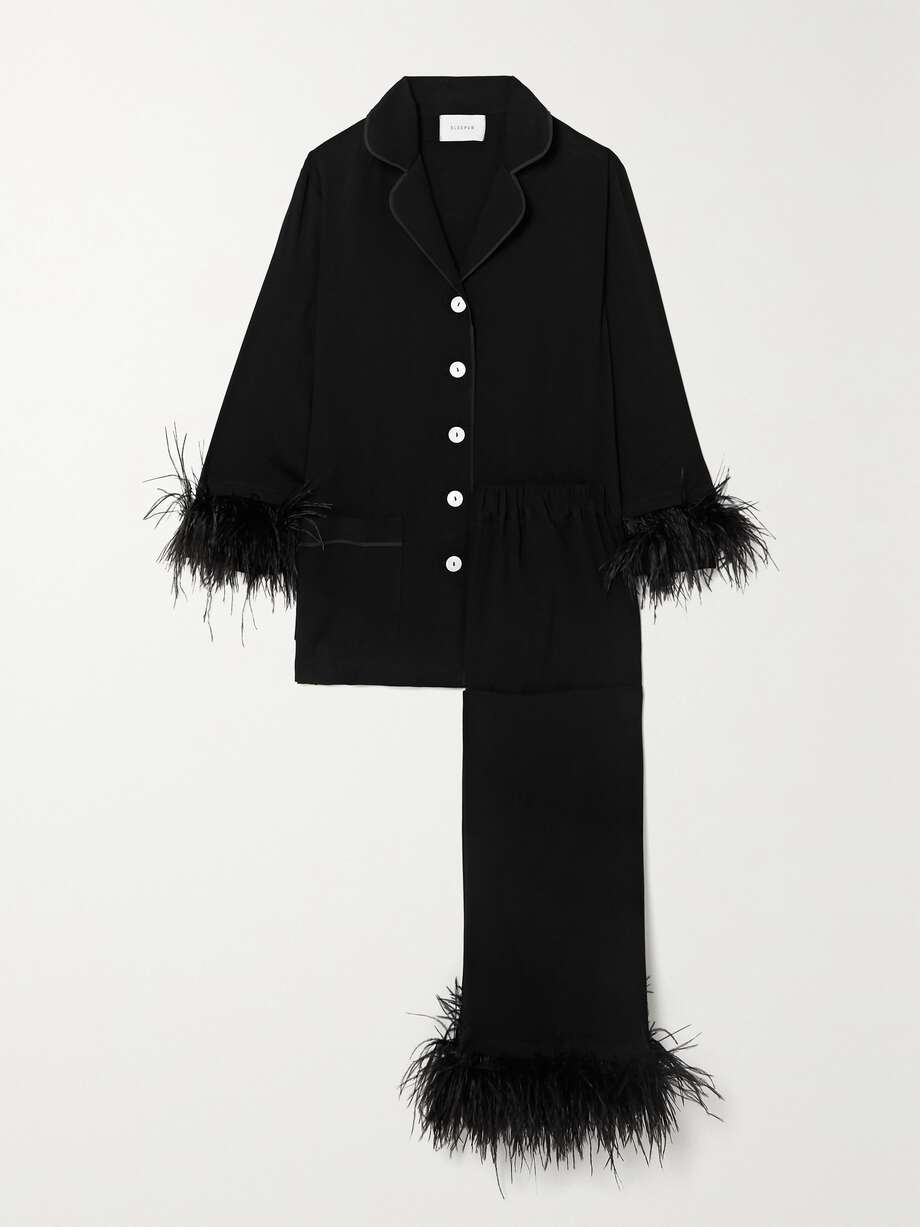 The Sleeper feather-trimmed crepe de chine pyjama set in black would make an indulgent gift for a loved one this Christmas. Cut from lightweight crepe de chine, this vintage-inspired pajama set features a black shirt with tonal piping and mother-of-pearl buttons. The cropped pants have an elasticated waist and the brand's signature feathers at the hem, which can be detached when you want to keep things simple. 