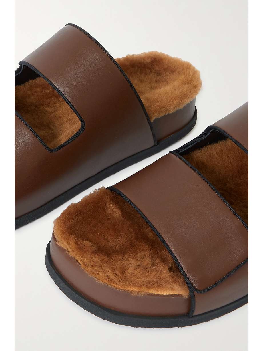 neous dombai shearling lined leather slides