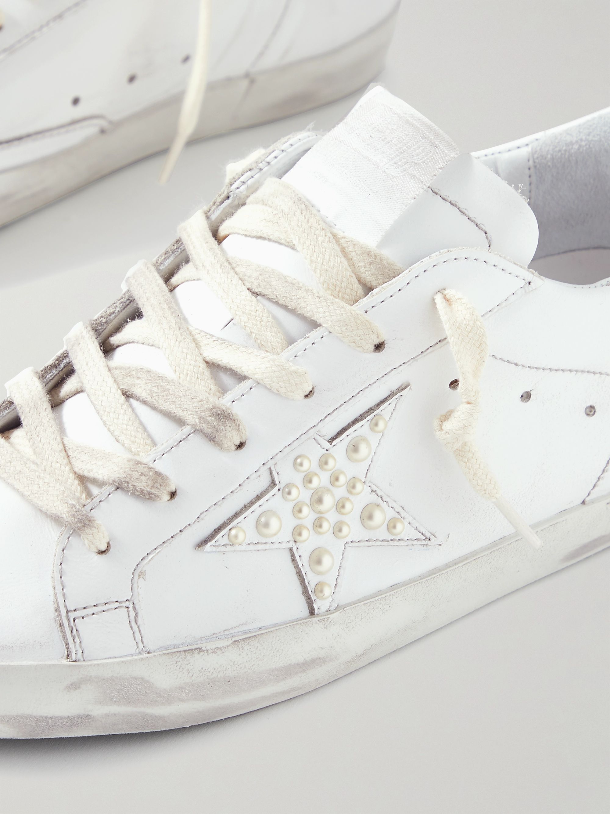 White Superstar faux pearlembellished distressed leather sneakers