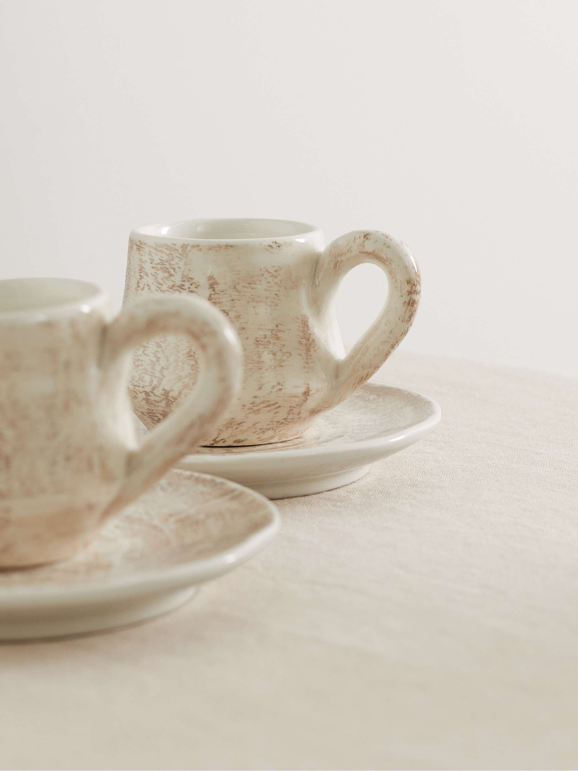 BRUNELLO CUCINELLI Set of two glazed ceramic mugs and saucers