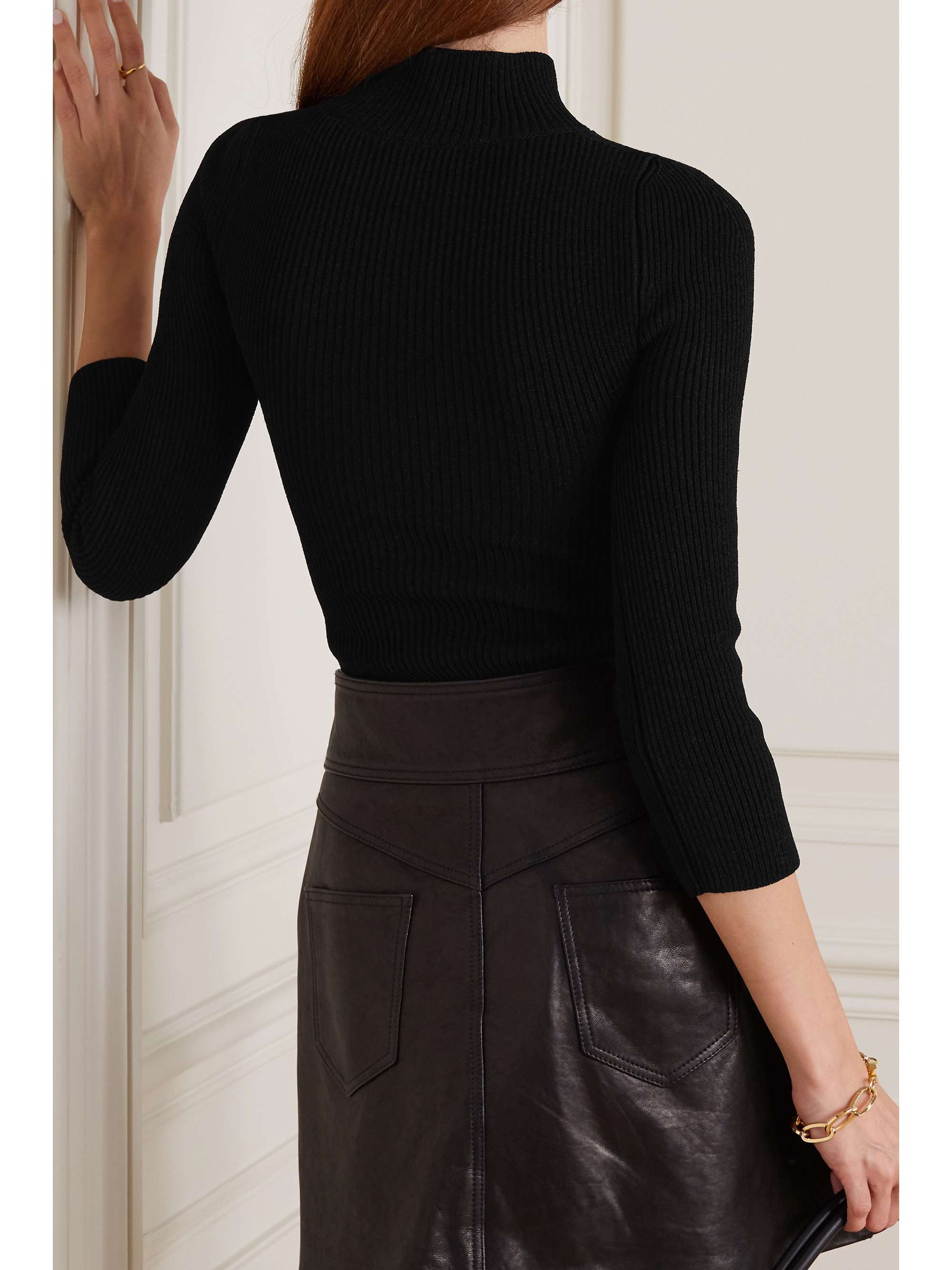 KHAITE Angela cutout ribbed-knit sweater | NET-A-PORTER