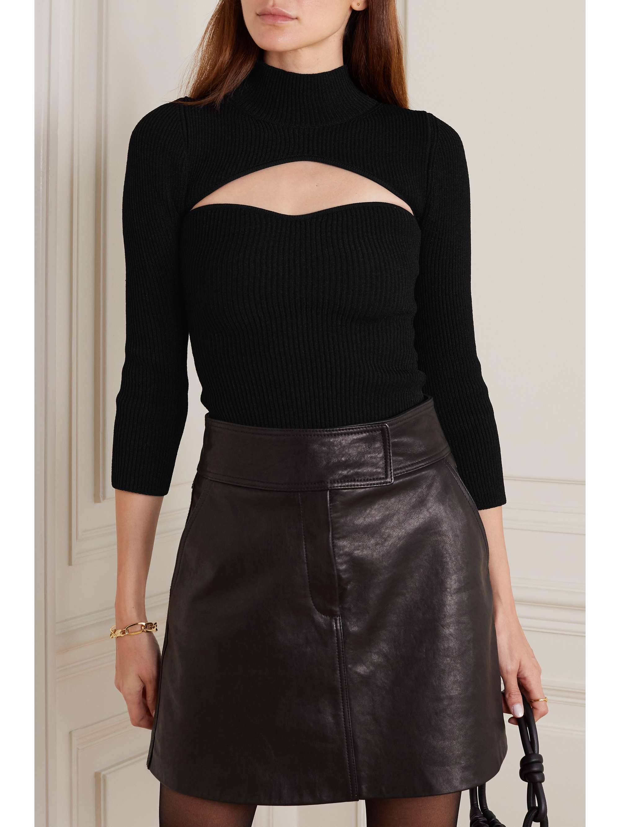 KHAITE Angela cutout ribbed-knit sweater
