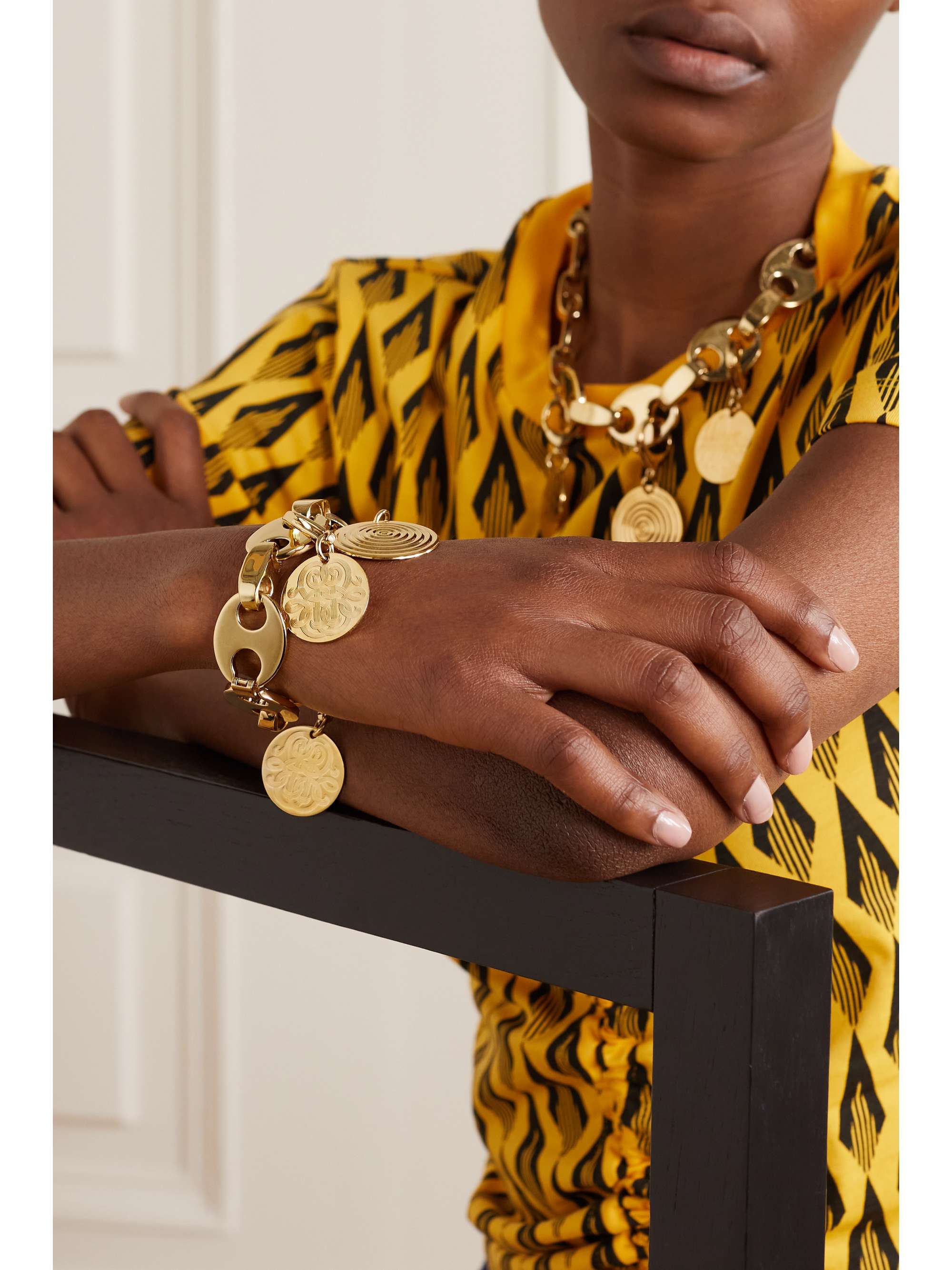 RABANNE Eight gold-tone metal bracelet