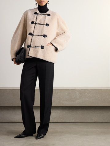 TOTEME Leather-trimmed shearling jacket