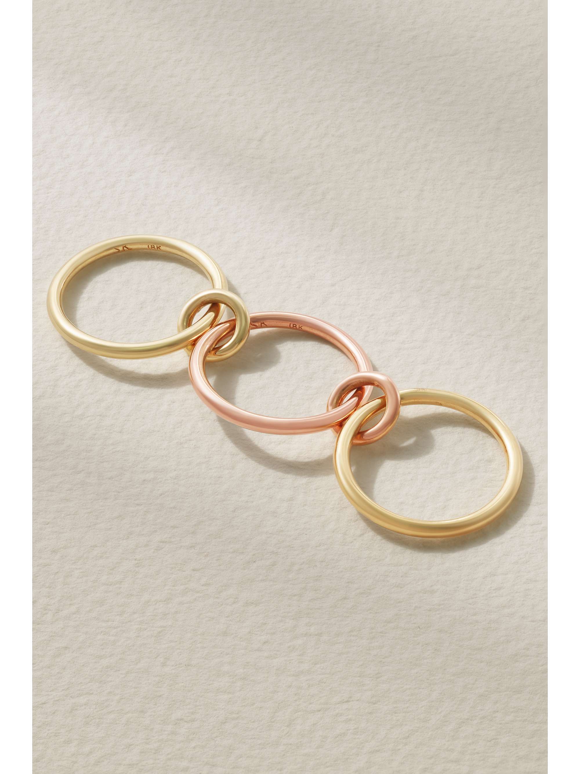 SPINELLI KILCOLLIN Solarium set of three 18-karat yellow and rose gold and sterling silver rings