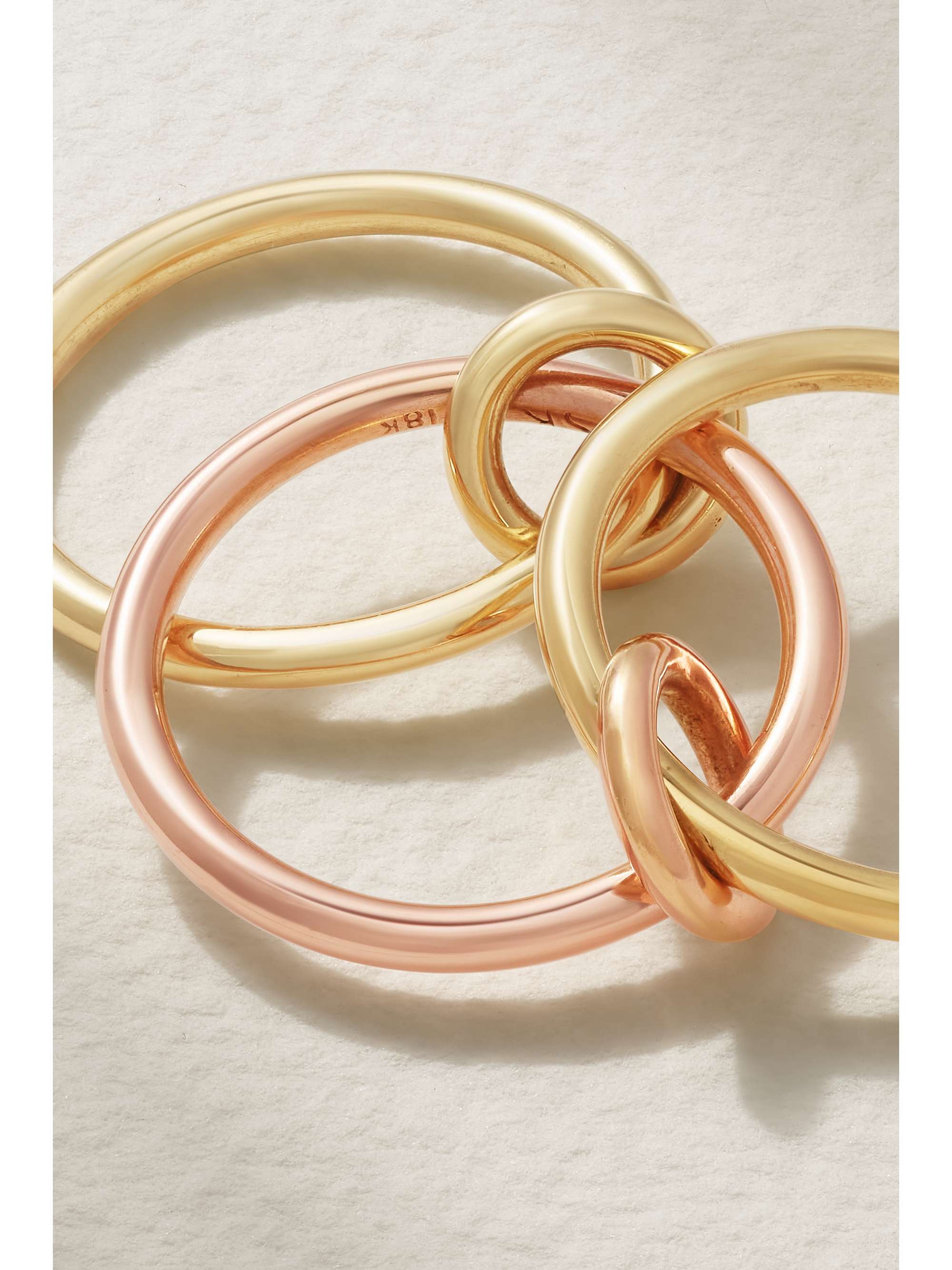 SPINELLI KILCOLLIN Solarium set of three 18-karat yellow and rose gold and sterling silver rings