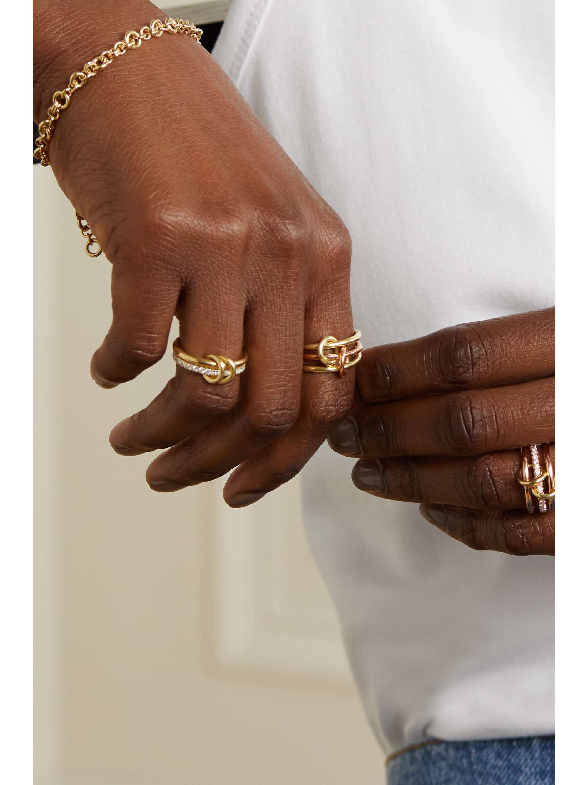 SPINELLI KILCOLLIN Solarium set of three 18-karat yellow and rose gold and sterling silver rings