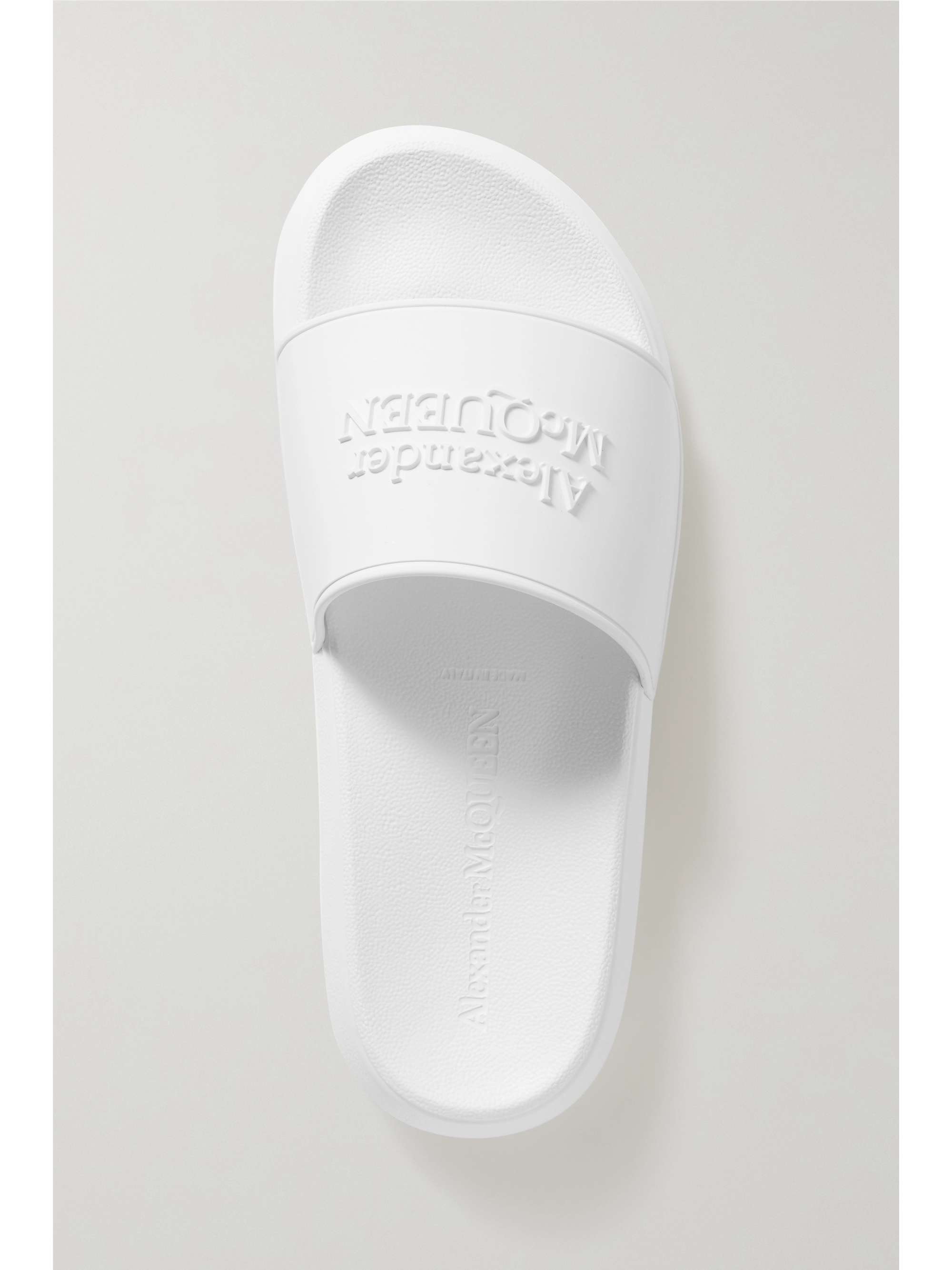 white rubber slides