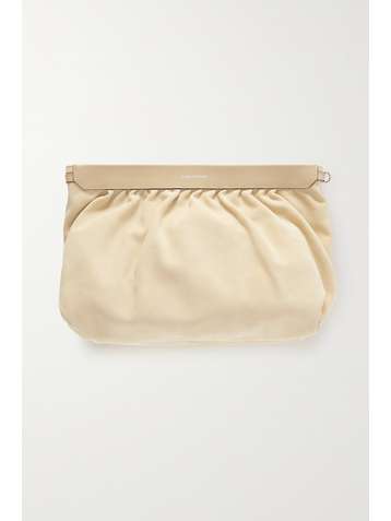 beige designer clutch