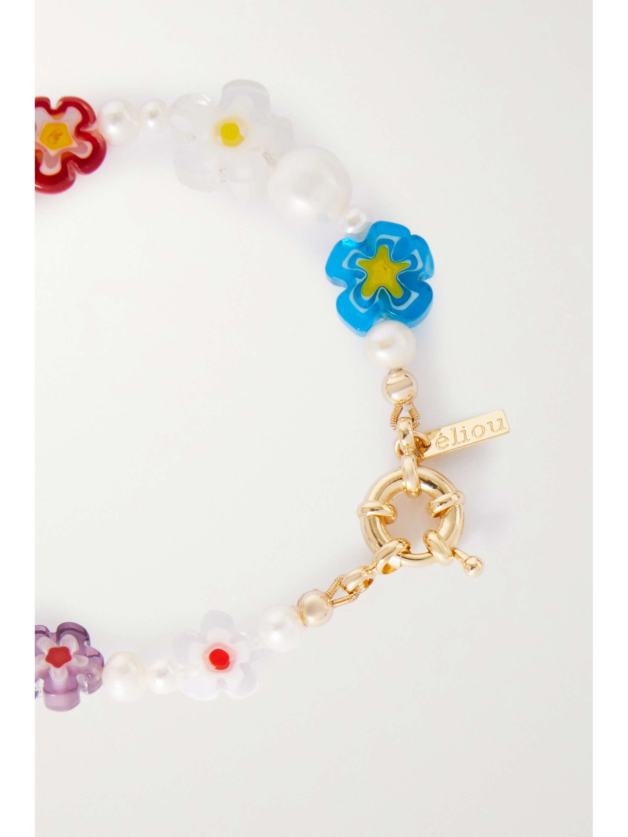 ÉLIOU Swing Armband mit Perle, Zierperlen und goldfarbenen Details