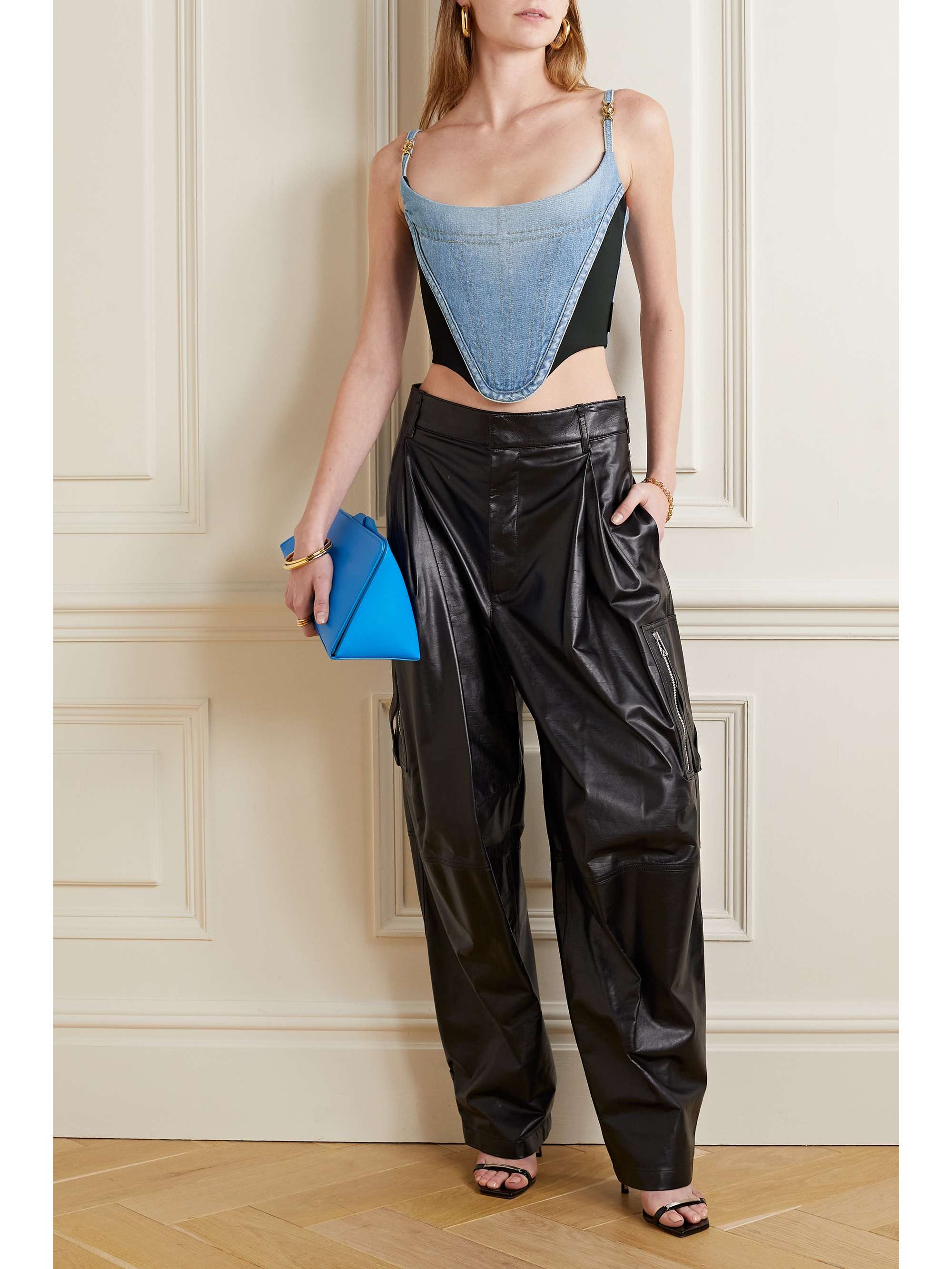 VERSACE Cropped embellished paneled denim and jersey bustier top