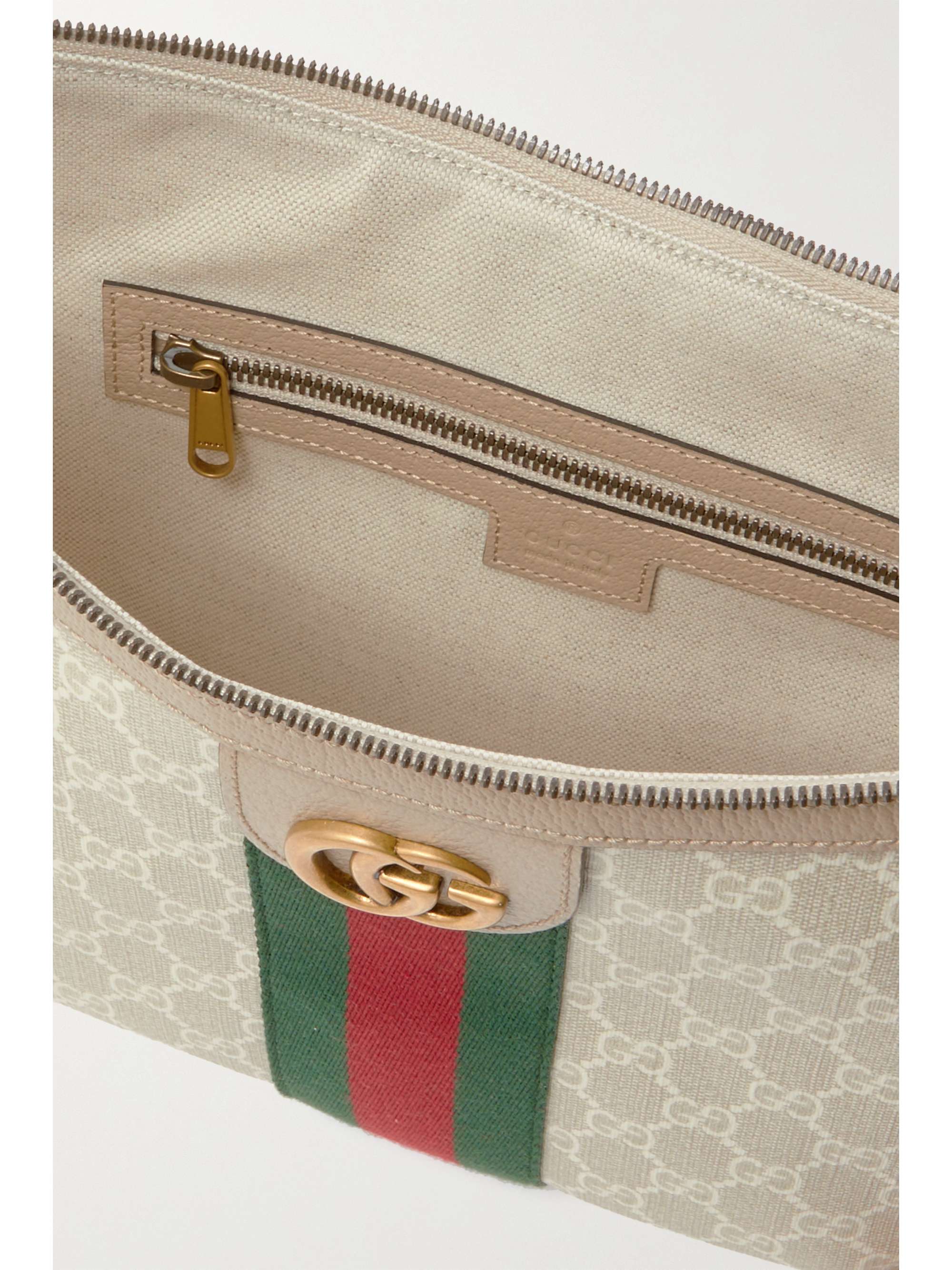 Small webbing-trimmed coated-canvas shoulder bag