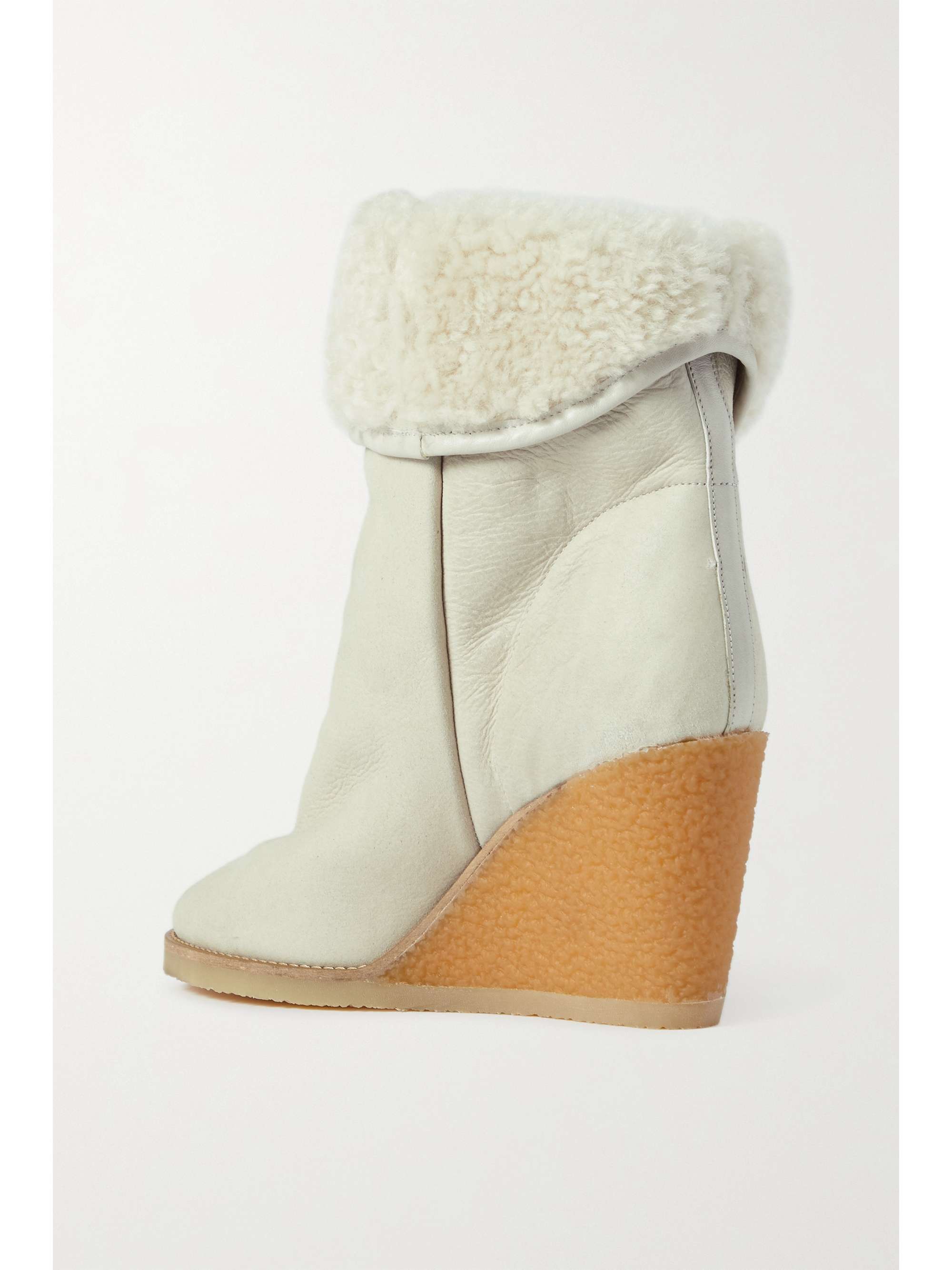 ISABEL MARANT Bottines compensées en daim doublées de peau lainée Totam