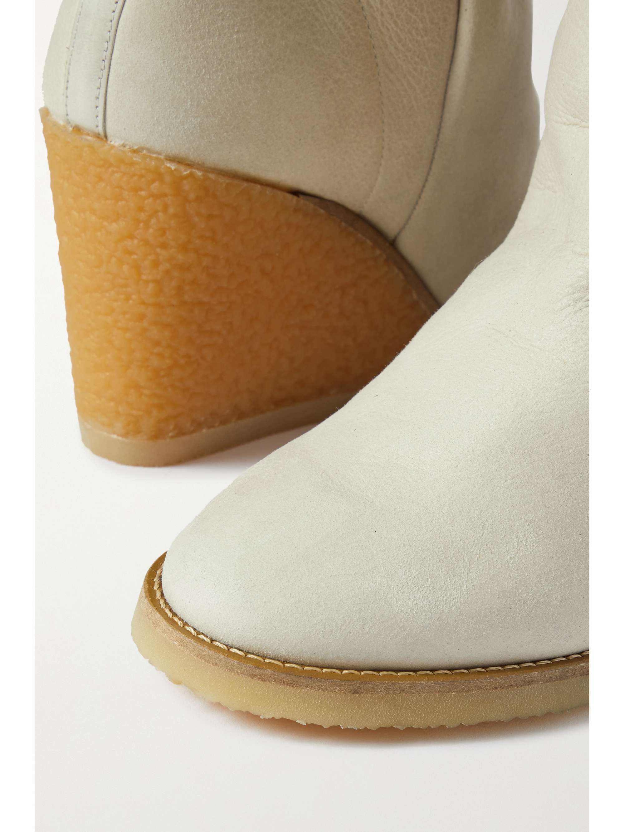 ISABEL MARANT Bottines compensées en daim doublées de peau lainée Totam