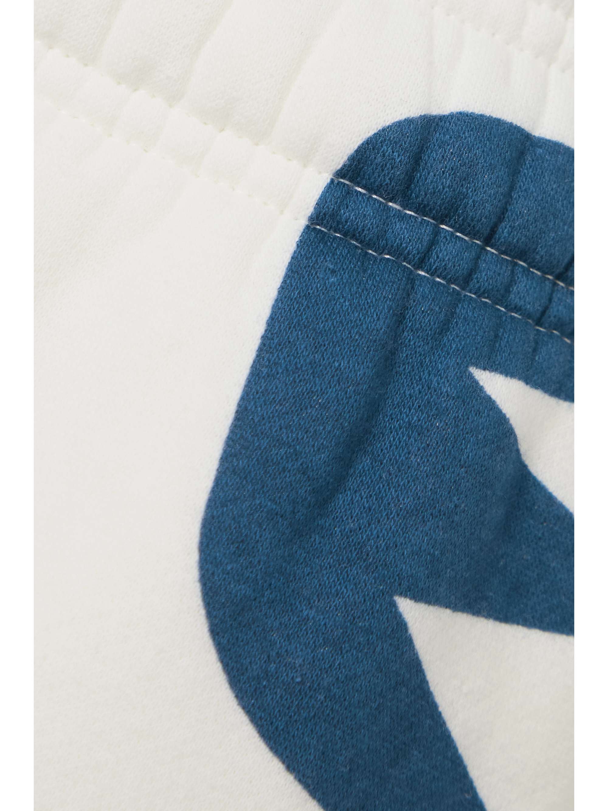 NIKE Printed cotton-blend jersey track pants