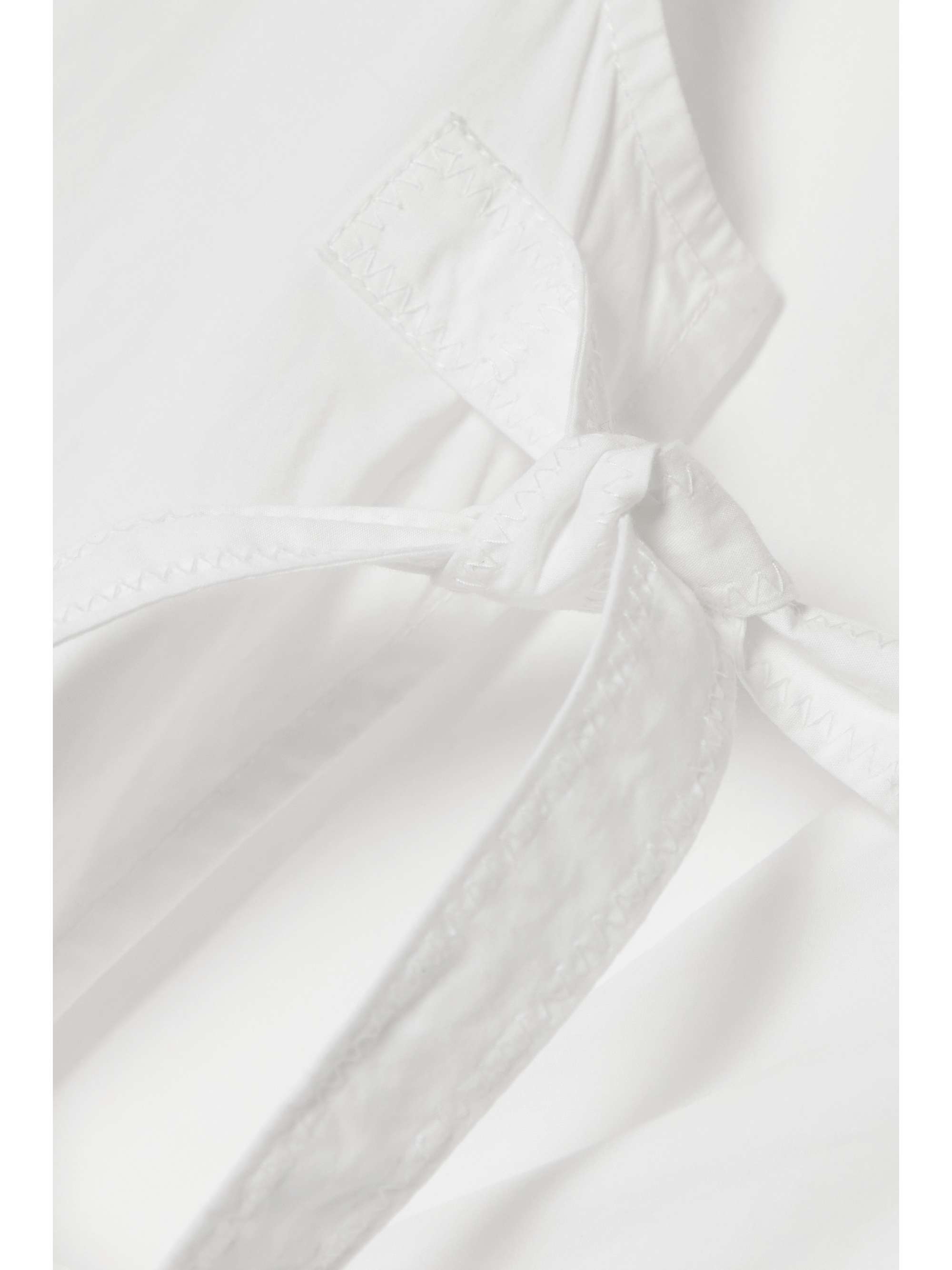 GANNI Tie-front organic cotton-poplin peplum blouse
