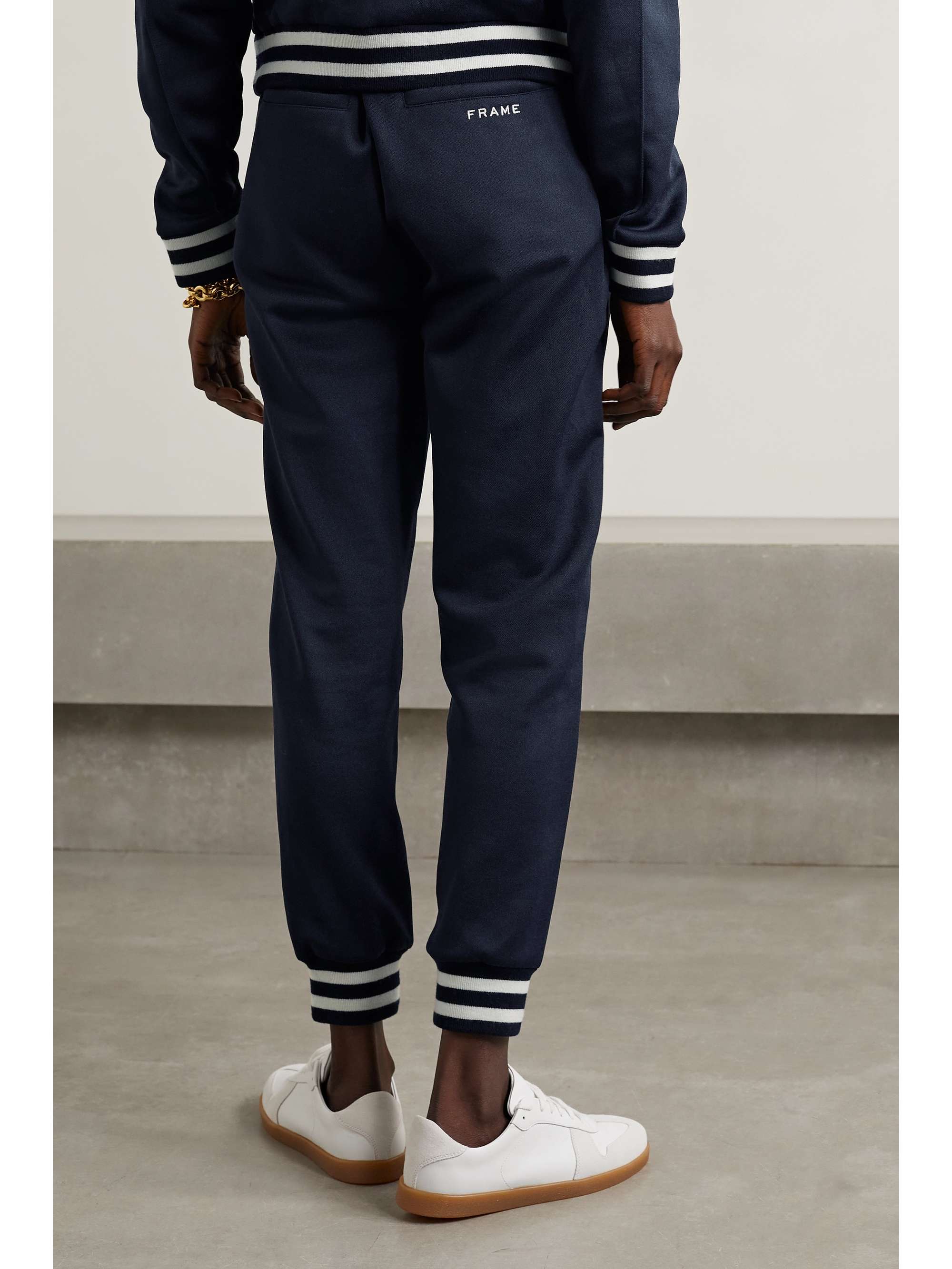 FRAME + Ritz Paris striped embroidered jersey track pants NETAPORTER