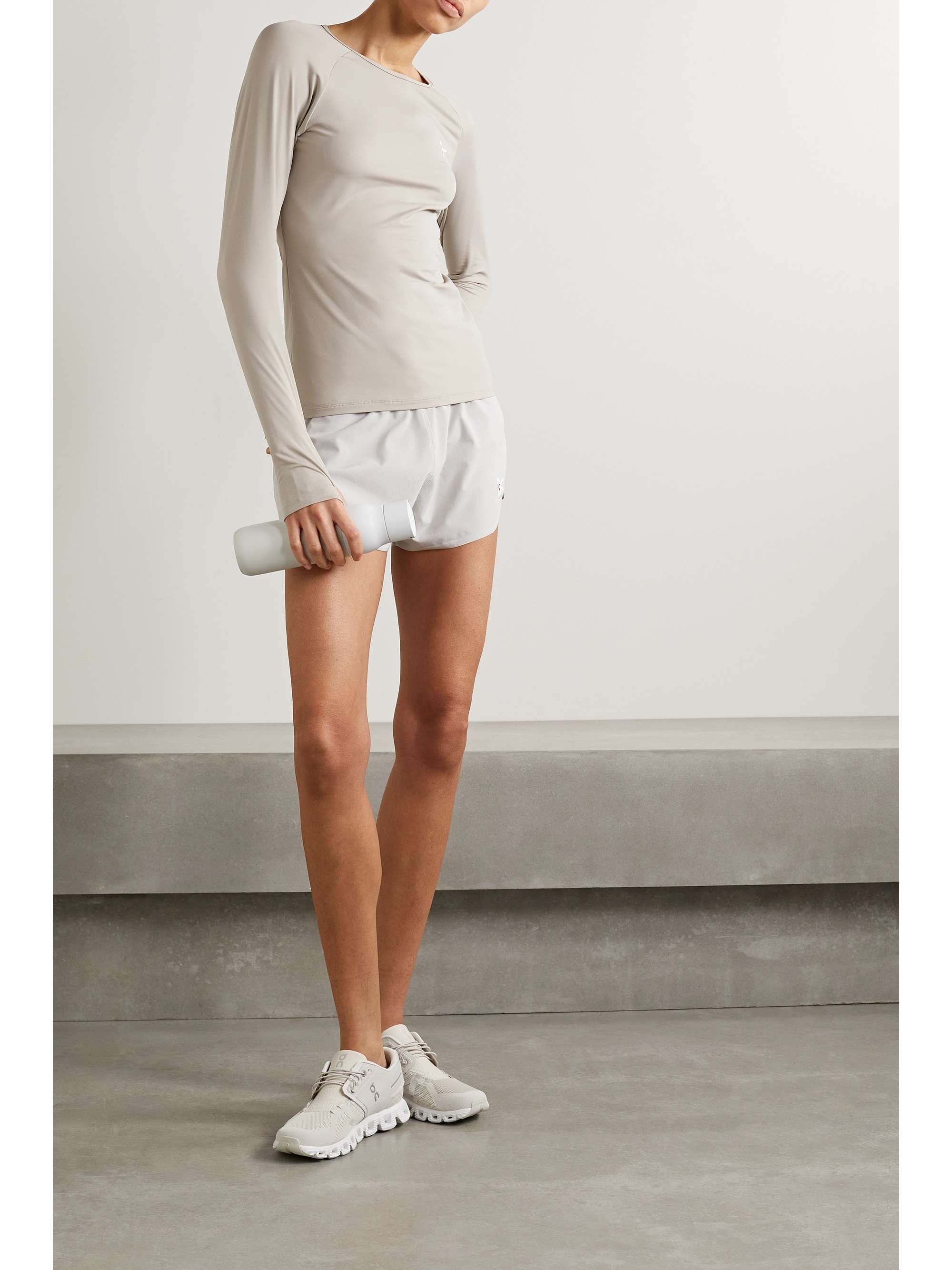 DISTRICT VISION Deva printed stretch-jersey top
