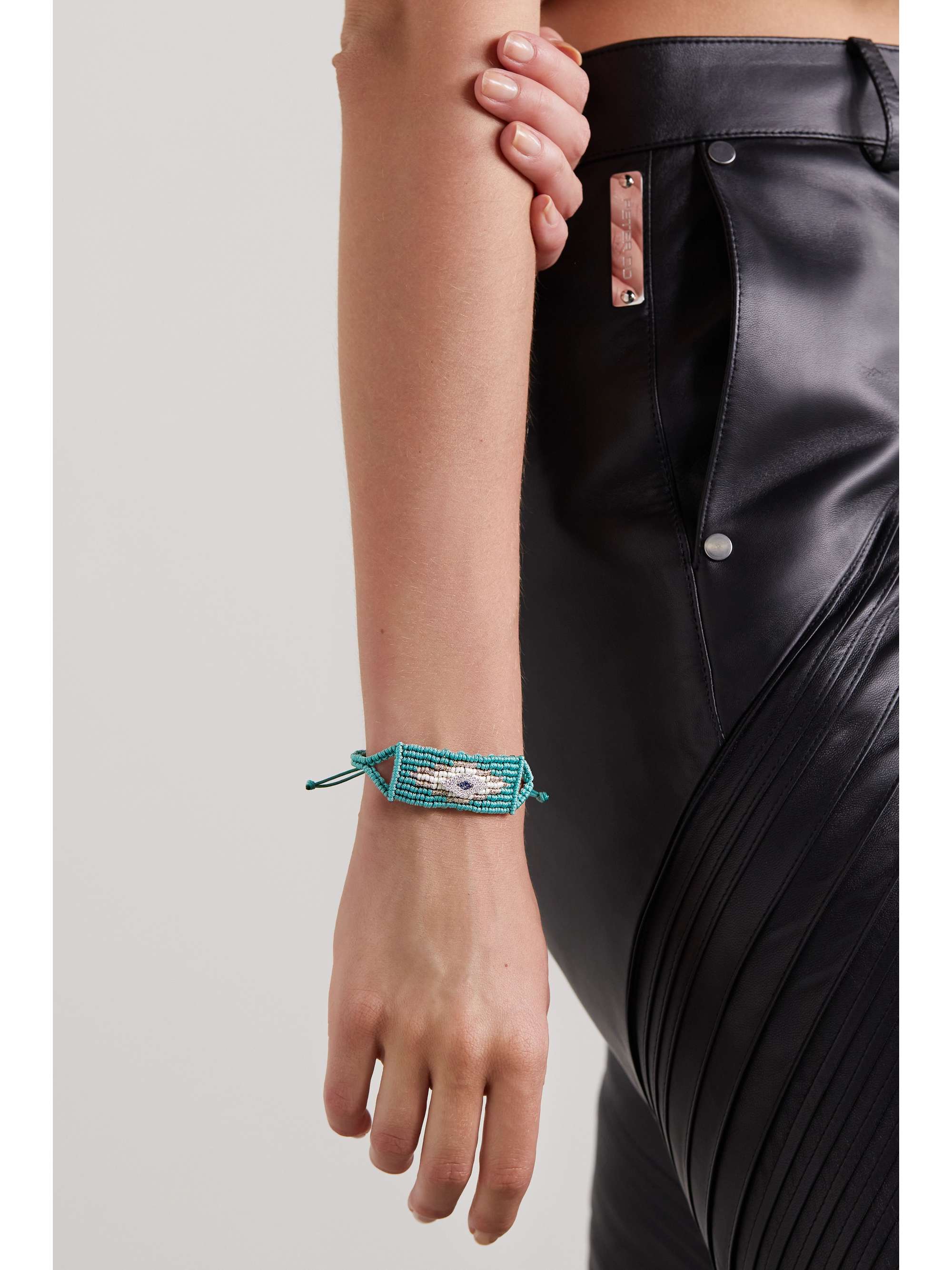DIANE KORDAS Evil Eye woven cord, diamond and sapphire bracelet