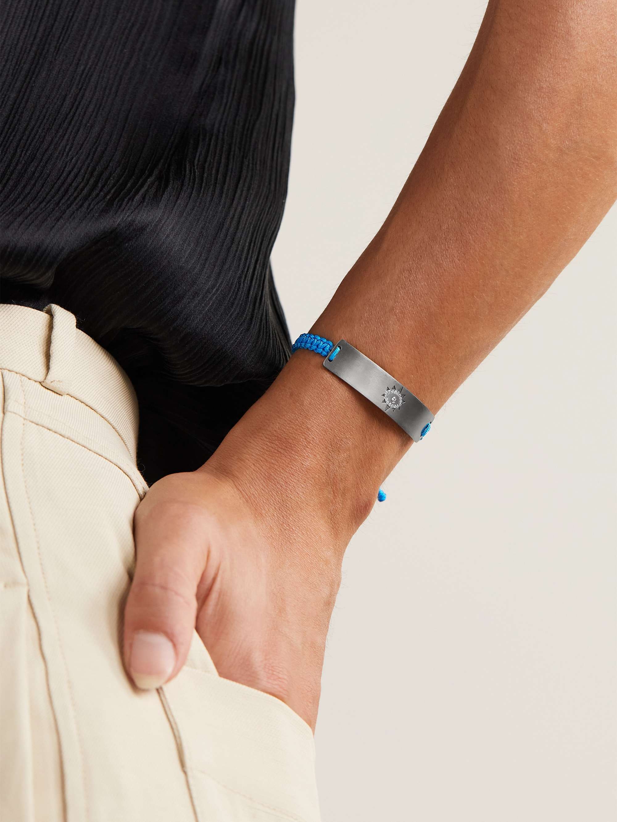 DIANE KORDAS Evil Eye titanium, cord and diamond bracelet