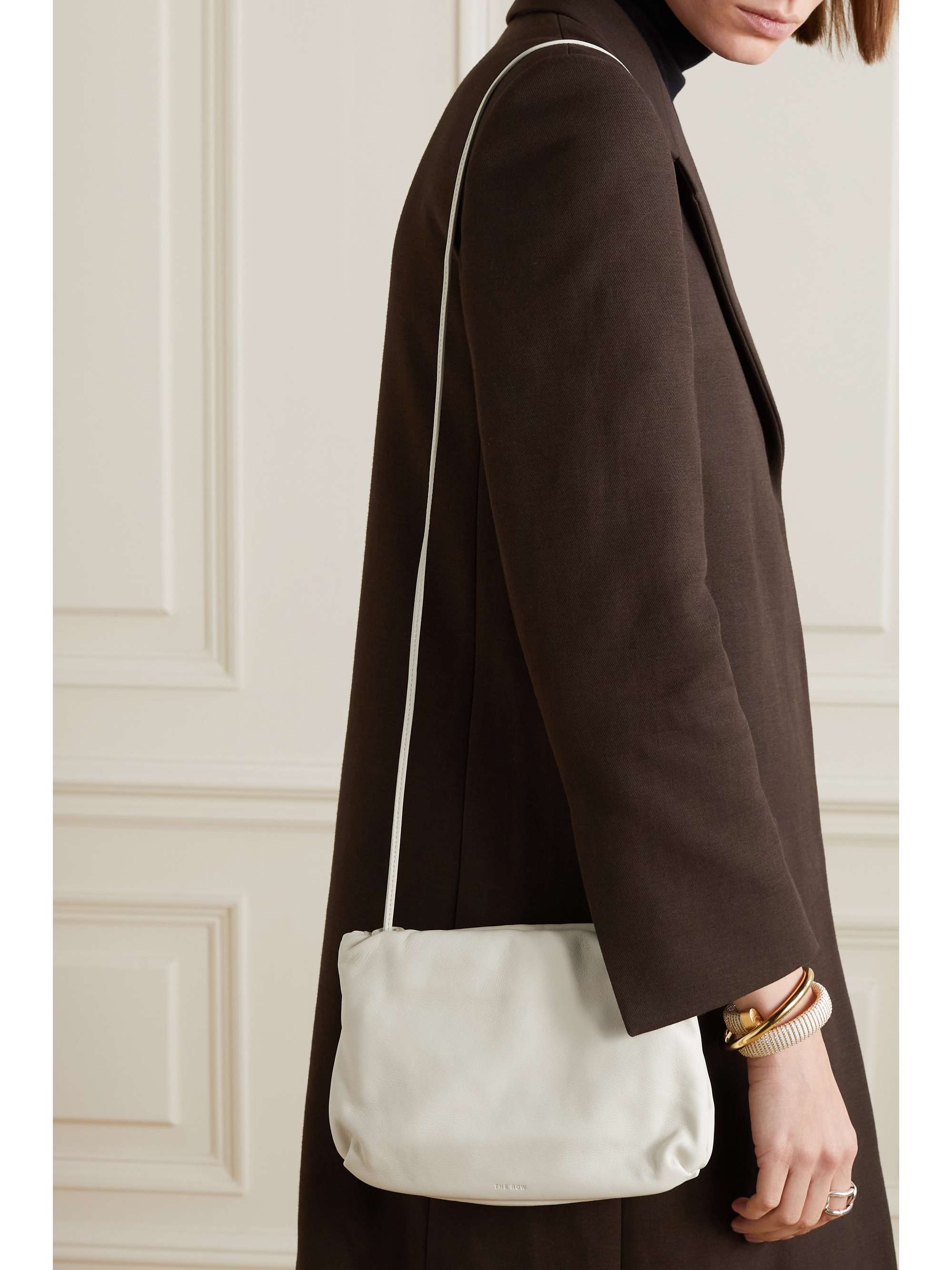 THE ROW Bourse leather clutch NETAPORTER