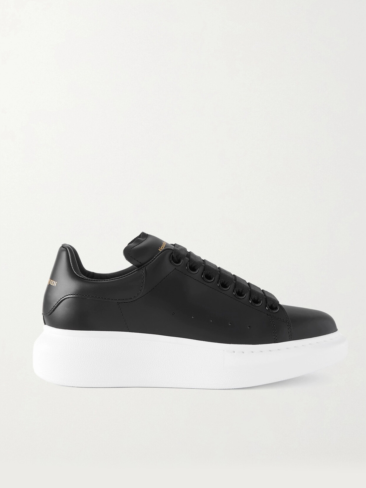 Alexander Mcqueen Leather Exaggerated-sole Trainers In Black