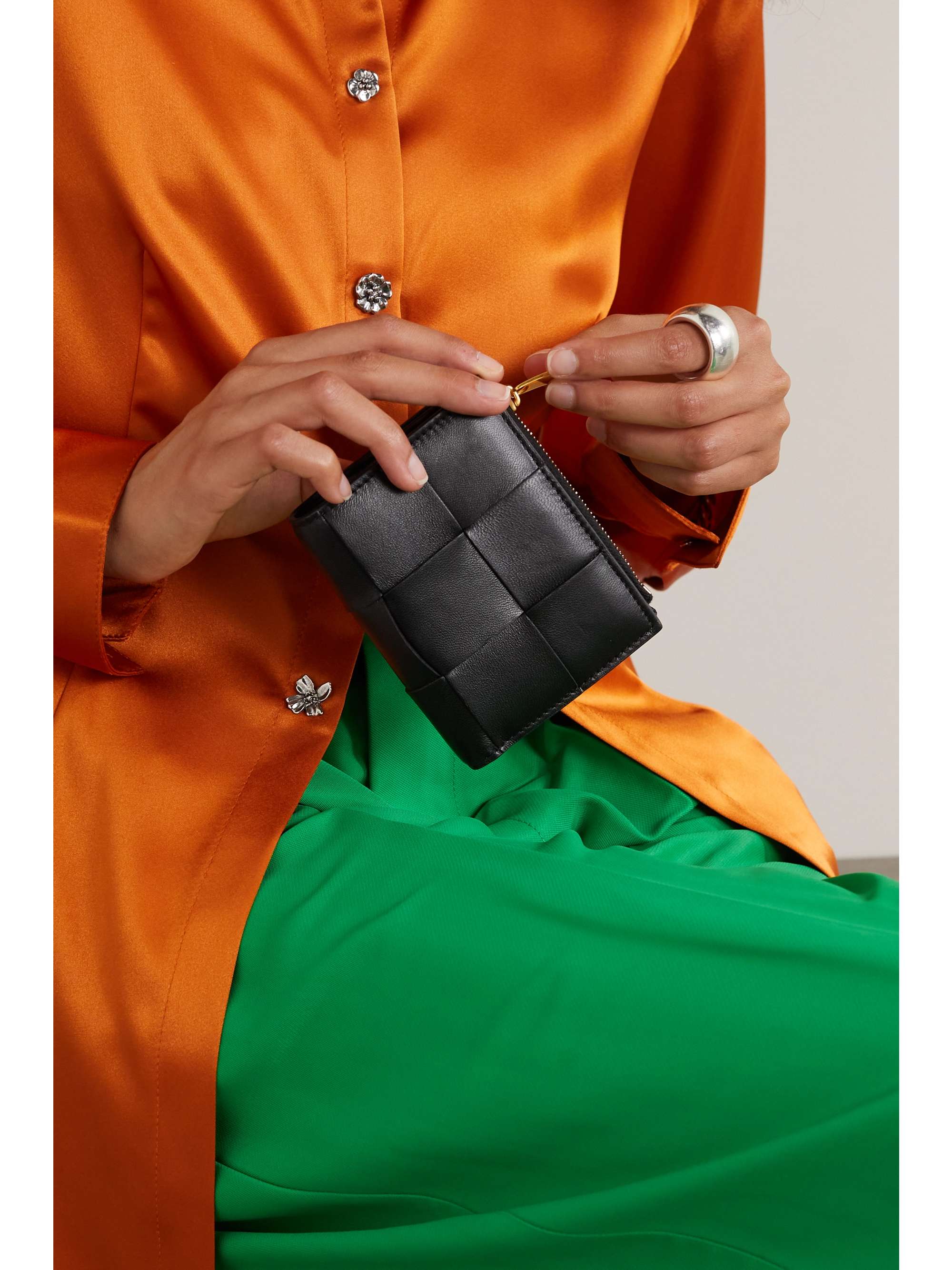 Intrecciato leather hotsell wallet