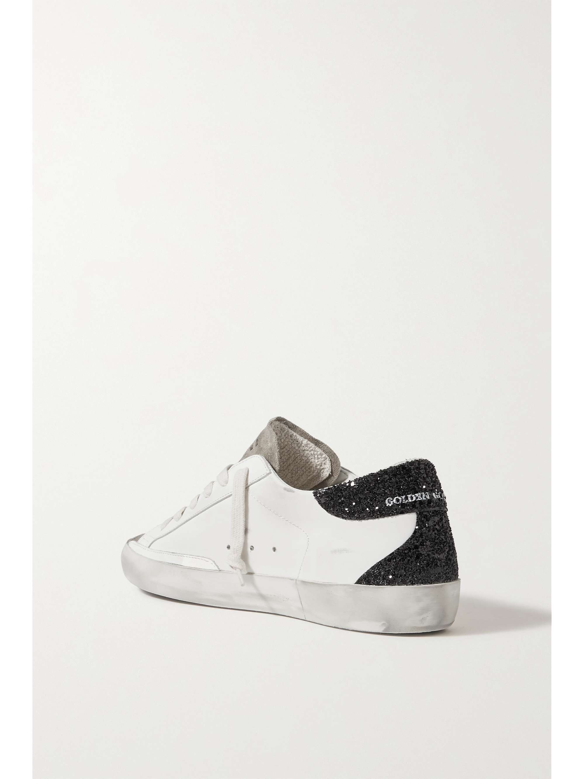 GOLDEN GOOSE Superstar distressed glittered leather sneakers
