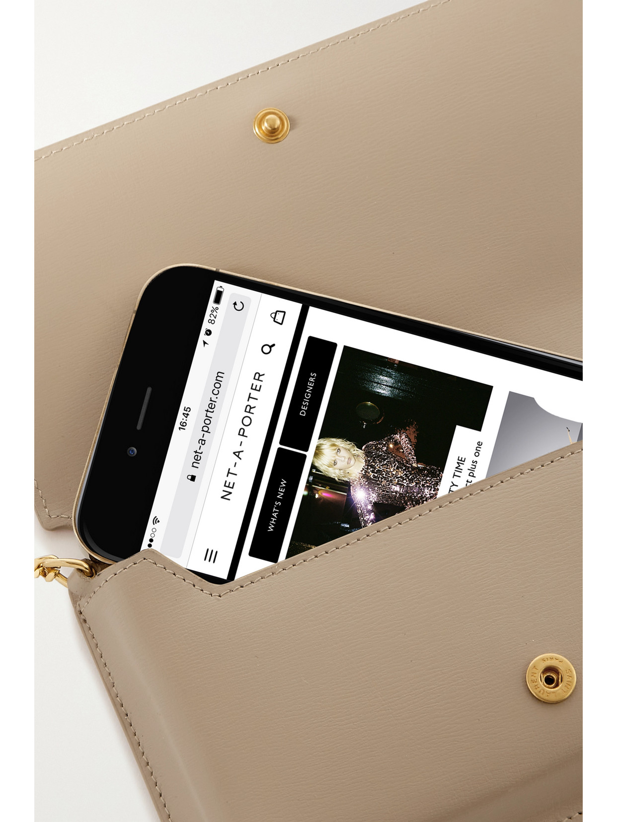 Shop Saint Laurent Cassandre Strap Leather Phone Case In Neutrals