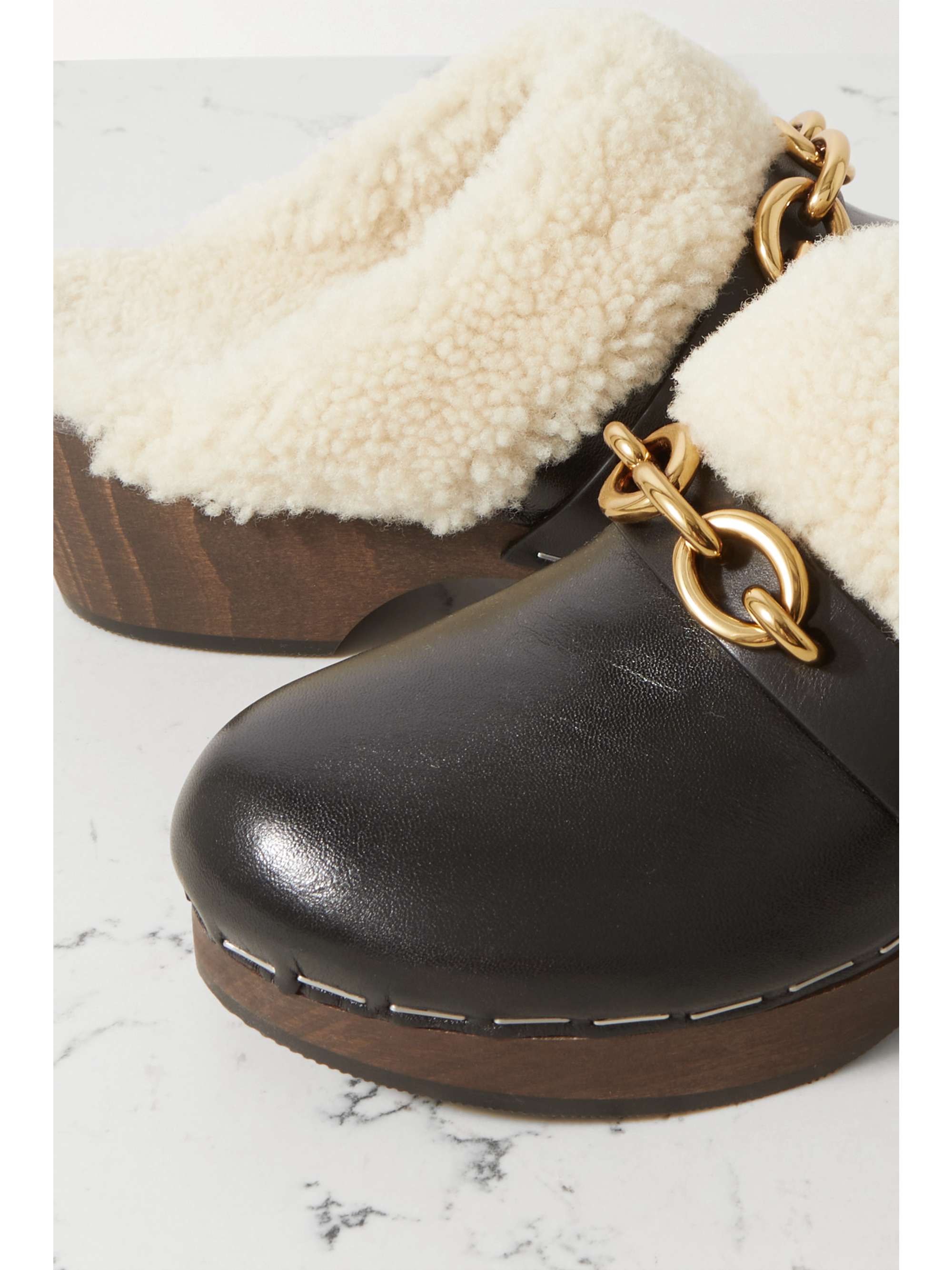 SAINT LAURENT Le Maillon embellished shearling-trimmed leather clogs