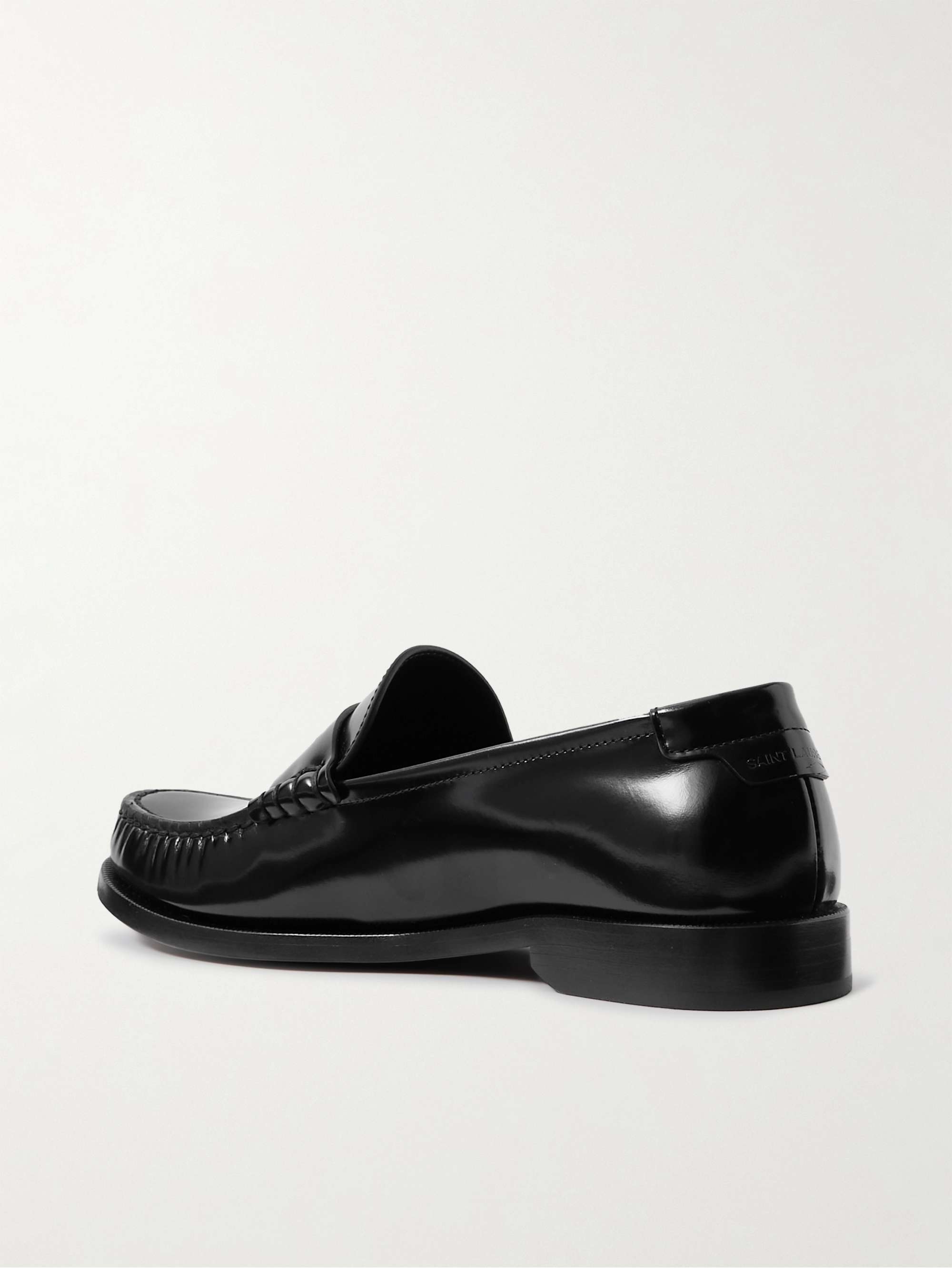 SAINT LAURENT Glossed-leather loafers